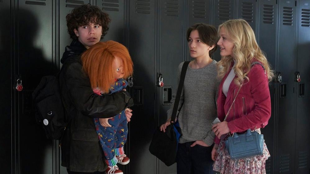 Jake, Chucky, Junior, and Lexy have an intense locker-side meeting. (Photo: Steve Wilkie/Syfy)