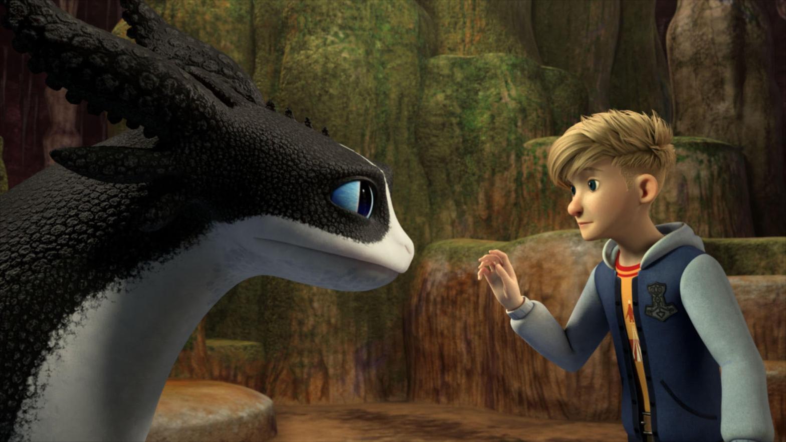 That kid looks shockingly unimpressed he's about to touch a dragon. (Image: Dreamworks Animation)