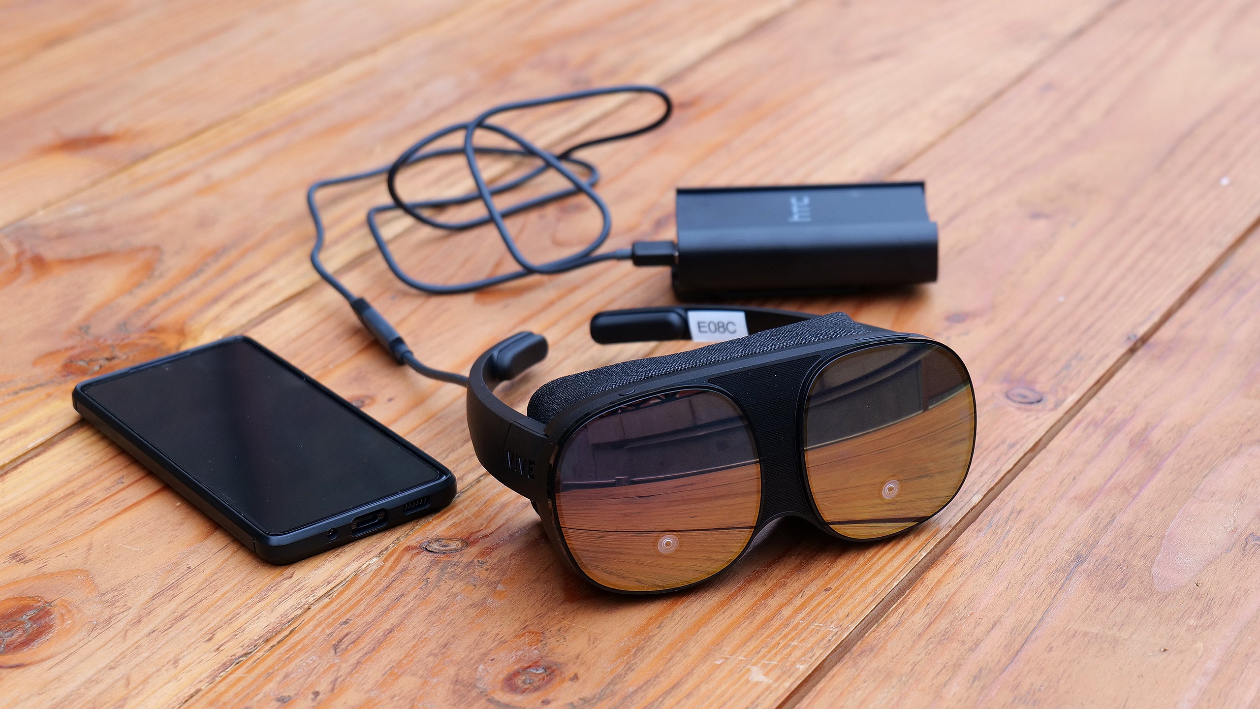 The Flow relies on an external battery connected via USB-C for power and a wireless connection to your phone for controls and visuals.  (Photo: Sam Rutherford)