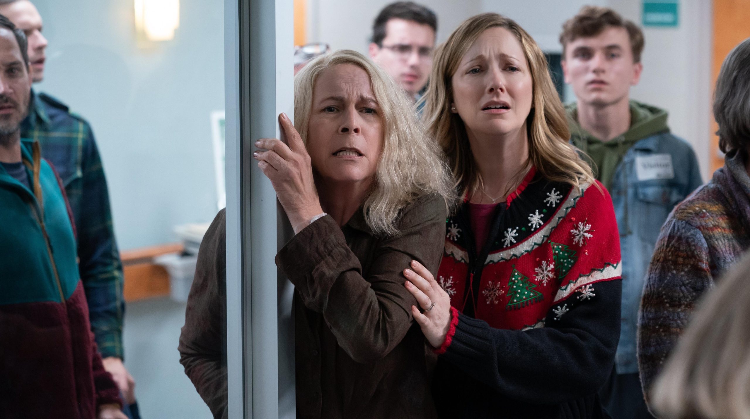 Laurie (Jamie Lee Curtis) with Karen (Judy Greer), who is indeed still wearing that Christmas sweater. (Image: Universal Pictures)