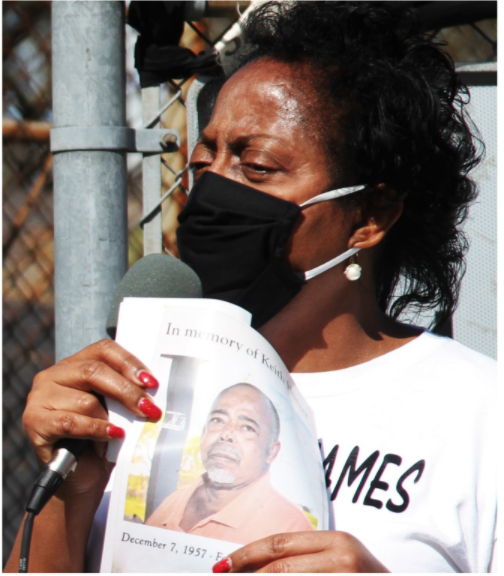 Lavigne speaks at a protest at the Army Corps of Engineers office in New Orleans. She is holding a photograph of a fellow advocate, Keith Hunter, who died of a sudden respiratory illness. (Photo: Centre for International Environmental Law (CIEL), the Centre for Biological Diversity, and Earthworks)