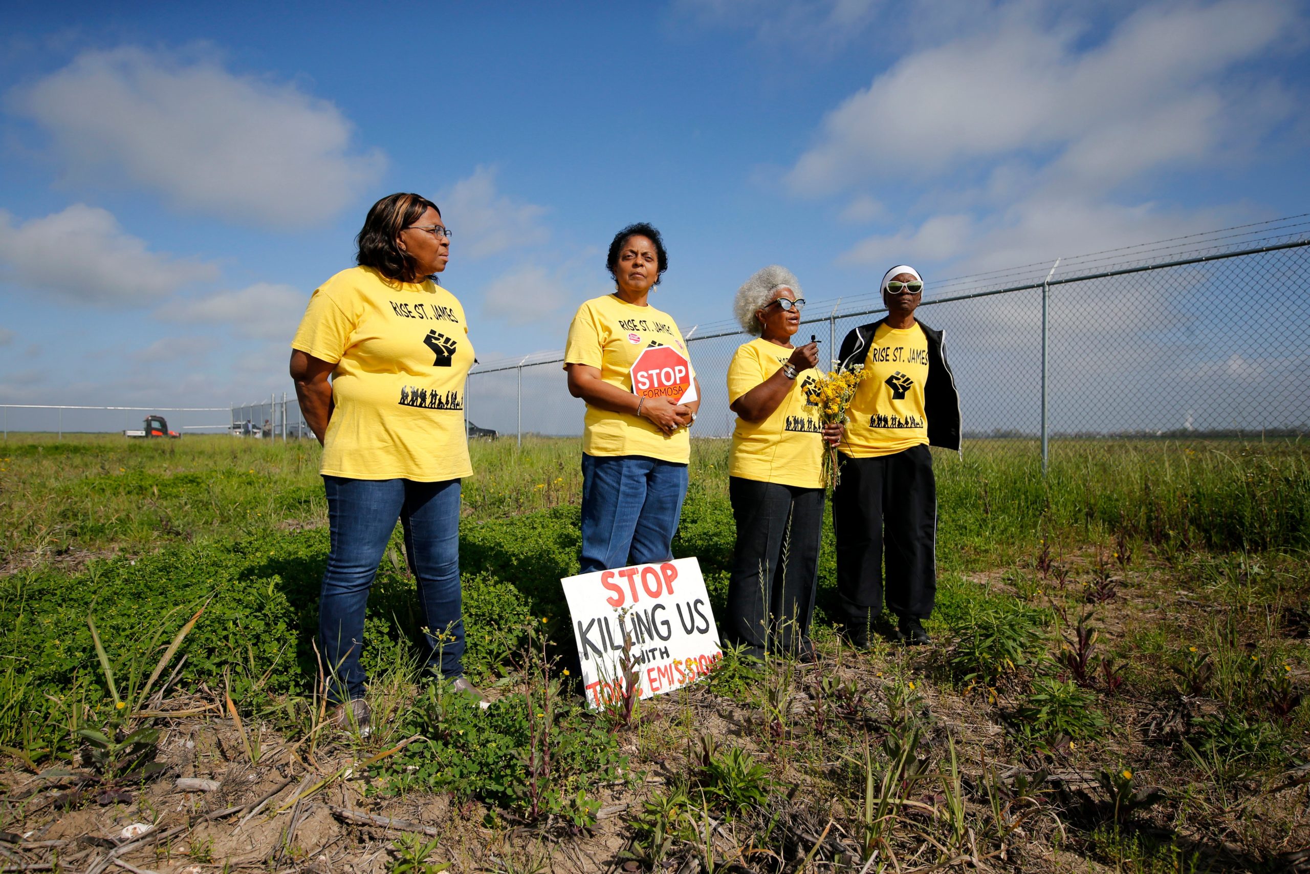 From left, Myrtle Felton, Sharon Lavigne, Gail LeBoeuf and Rita Cooper, members of RISE St. James, conduct a live stream video on property owned by Formosa in St. James Parish, Louisiana on Wednesday, March 11, 2020. (Photo: Gerald Herbert, AP)