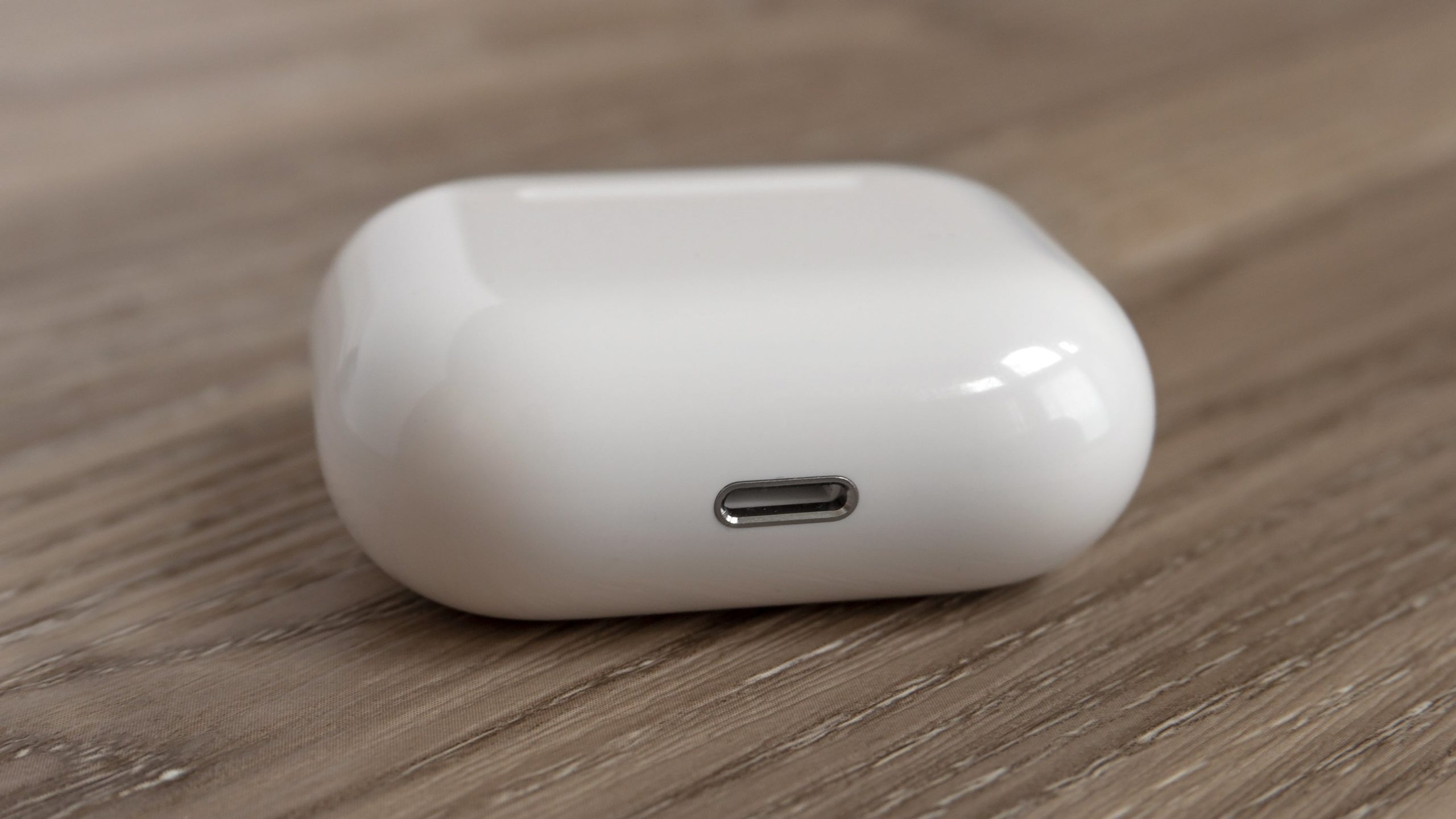 If you want to charge the AirPods case as quickly as possible, you'll need to keep a Lightning cable on hand — that's not a USB-C port. (Photo: Andrew Liszewski - Gizmodo)