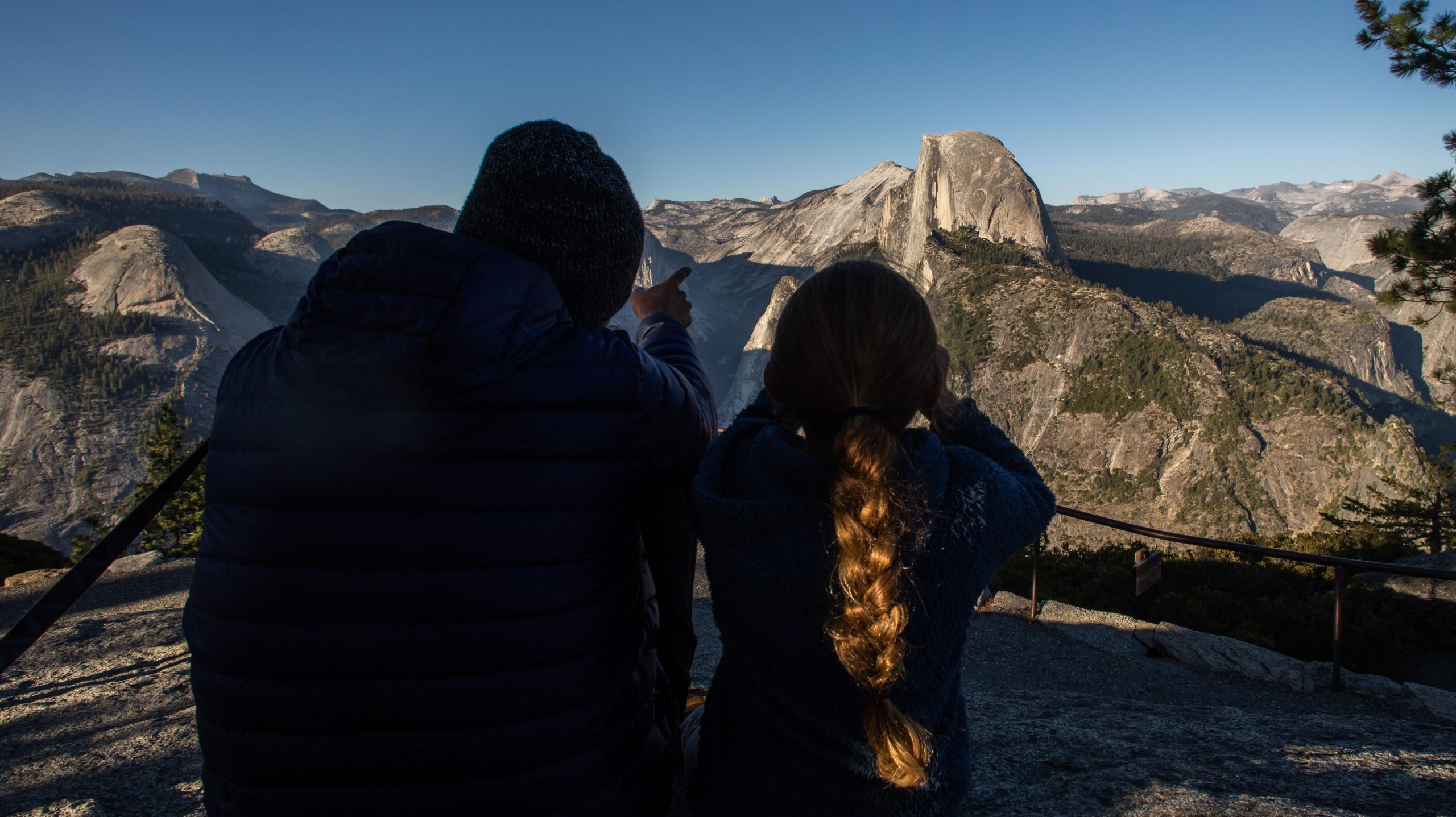 Visitors at Yosemite National Park look at Half Dome. (Photo: Apu Gomes/AFP, Getty Images)