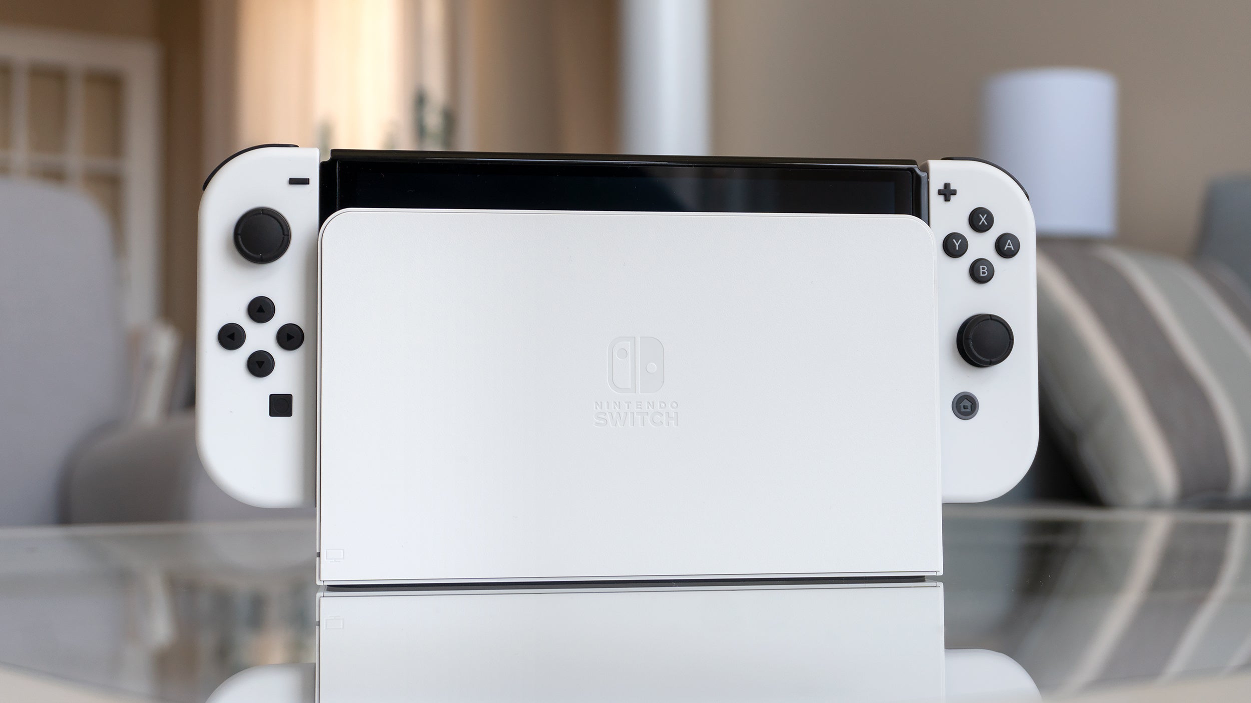 Rounded corners on the new Switch OLED's dock should ensure that... well... at least they look nice. (Photo: Andrew Liszewski - Gizmodo)