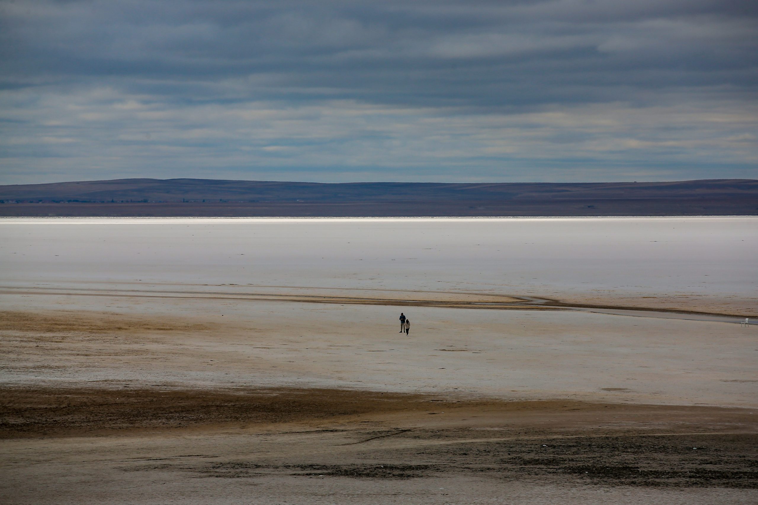 A man walks along Lake Tuz, Monday, Oct. 25, 2021. (Photo: Emrah Gurel, AP)