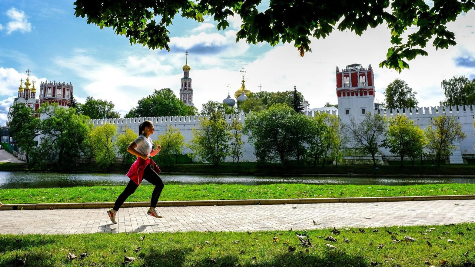 A woman jogs near the Novodevichy Convent in central Moscow on September 14, 2020.  (Image: Yuri Kadobnov/AFP, Getty Images)