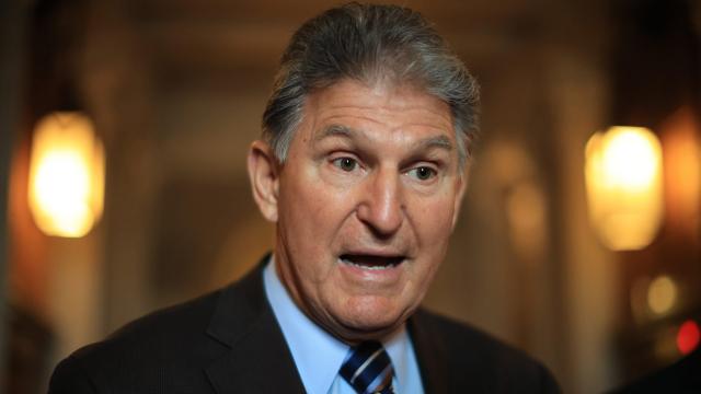 Joe Manchin’s Maserati Surrounded by Protesters Who Want a Liveable Planet After Joe Manchin and His Maserati Are Dead