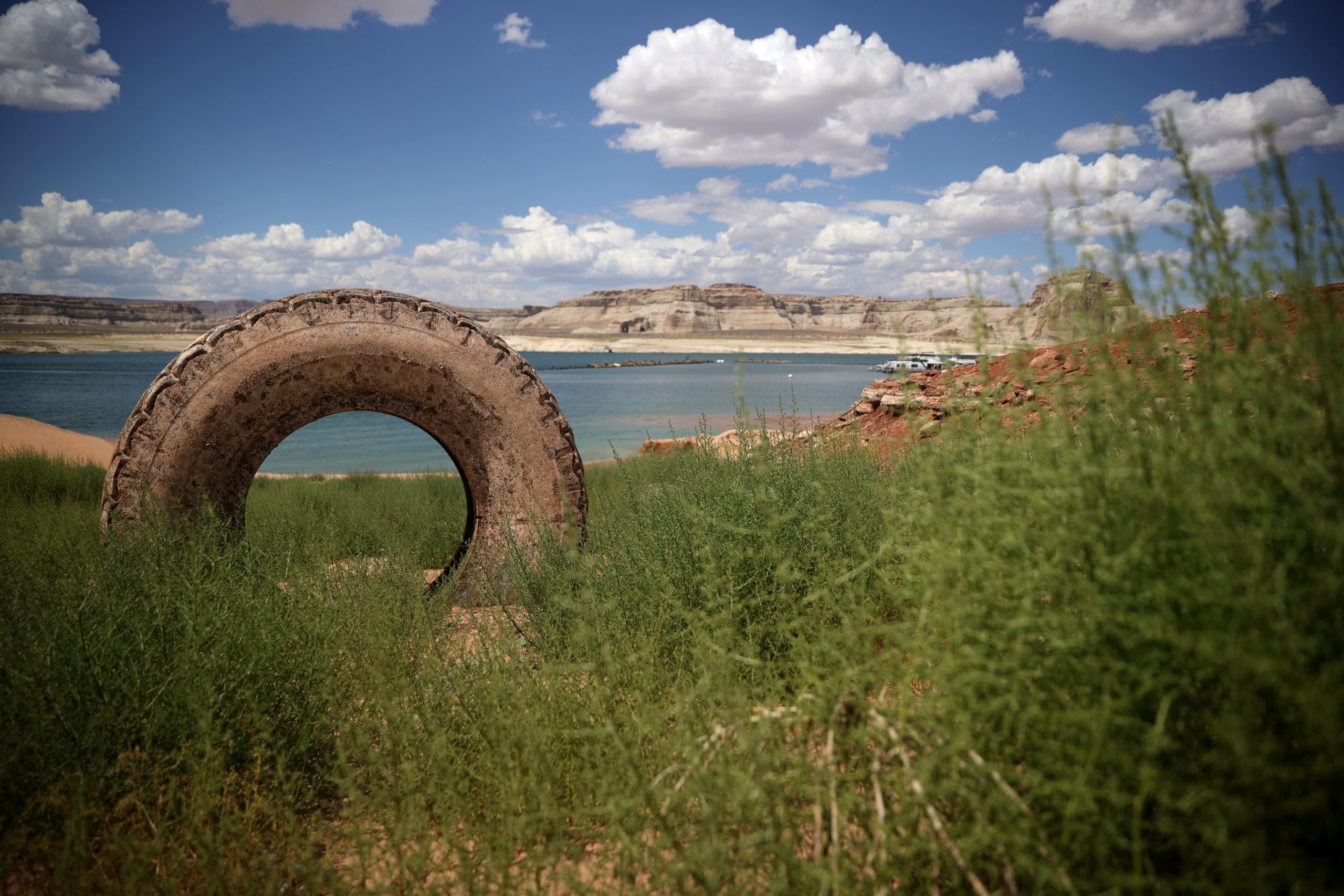  A tire sits on dry land in a section of Lake Powell that used to be underwater on June 24, 2021 in Lake Powell, Utah. (Photo: Justin Sullivan, Getty Images)