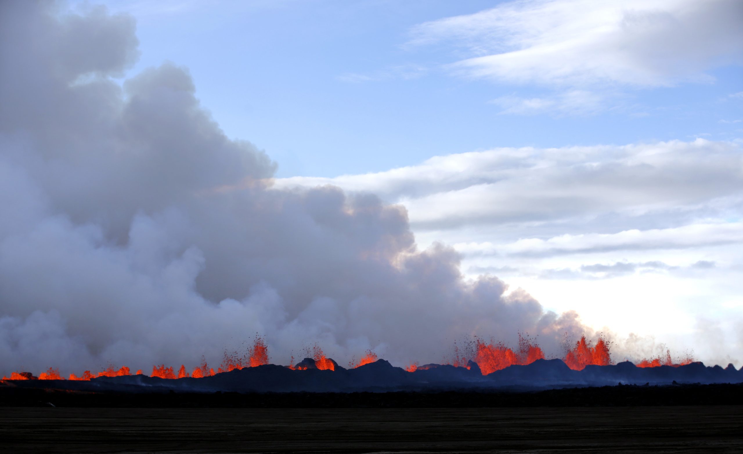 Smoke rises from the lava eruption on Holuhraun, northwest of the Dyngjujoekull glacier in Iceland, Monday, Sept. 1, 2014.  (Photo: Eggert Johannesson, AP)