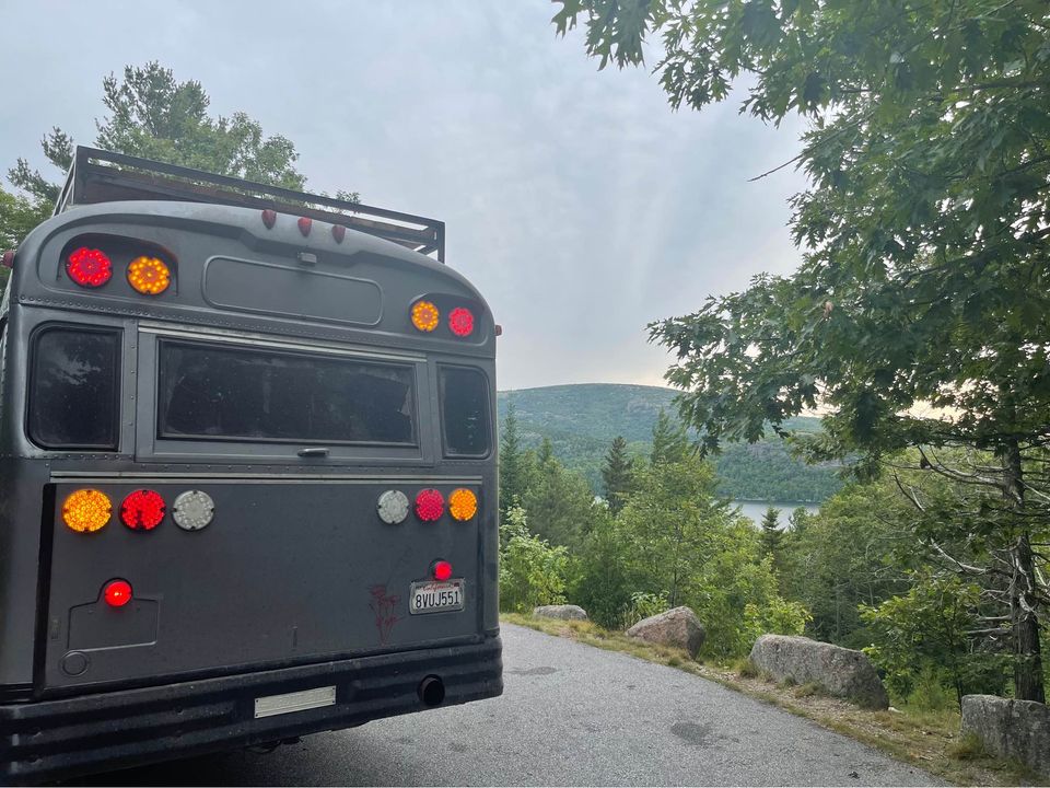 This Wild School Bus RV Has Underglow and a Fire Pit on Its Roof