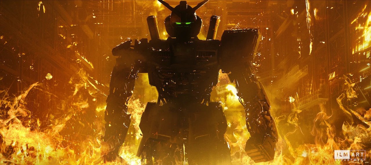 A giant Gundam robot strolls through fire. (Image: Sunrise/Netflix)