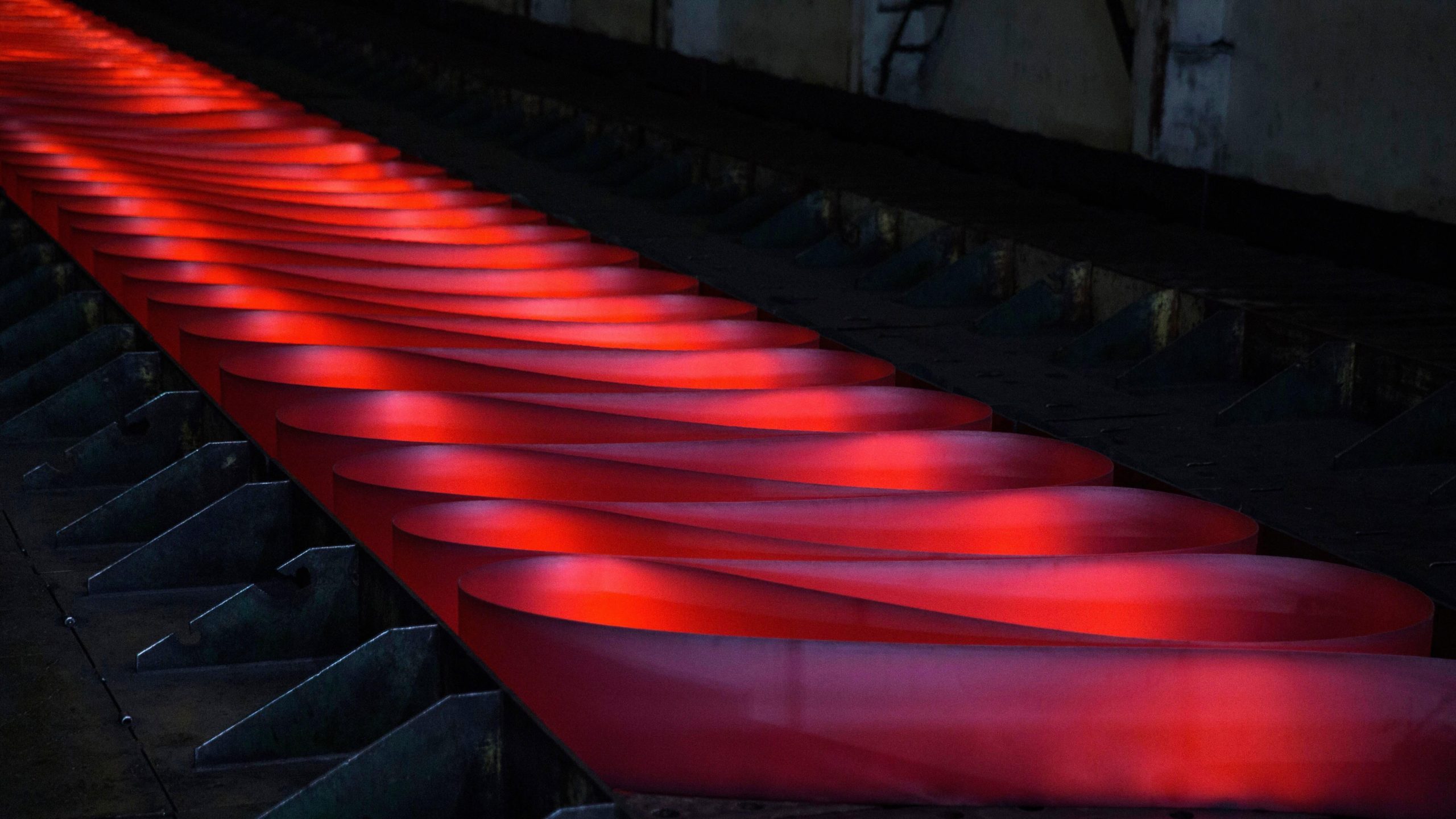 Red hot rolled steel is seen on the production line at Zhong Tian (Zenith) Steel Group Corporation. (Photo: Kevin Frayer, Getty Images)
