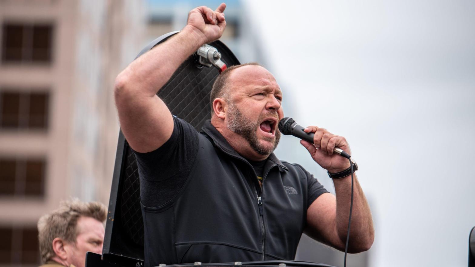 InfoWars host Alex Jones, seen at a rally against coronavirus lockdowns outside the Texas State Capital building in April 2020 in Austin, Texas. (Photo: Sergio Flores, Getty Images)