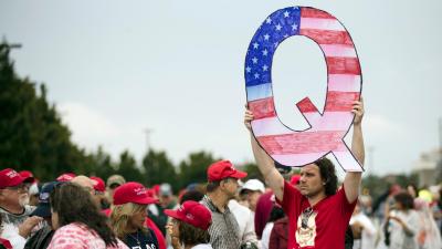 Two Weeks Later, QAnon Supporters Are Still Awaiting JFK Jr.’s Return at the Grassy Knoll