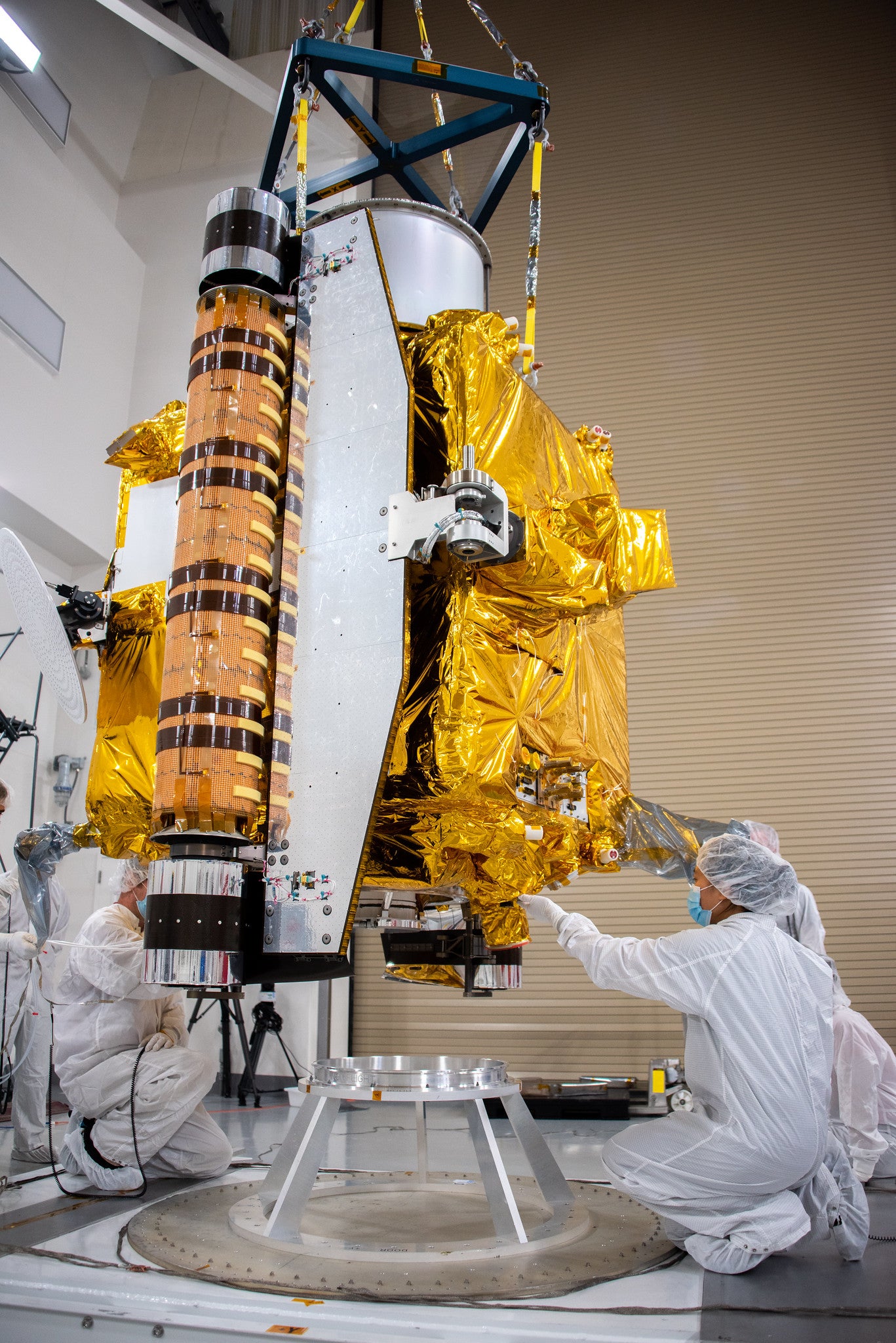 Technicians work on the DART spacecraft at Vandenberg Space Force Base in California on Oct. 4, 2021. (Photo: USSF 30th Space Wing/Aaron Taubman)