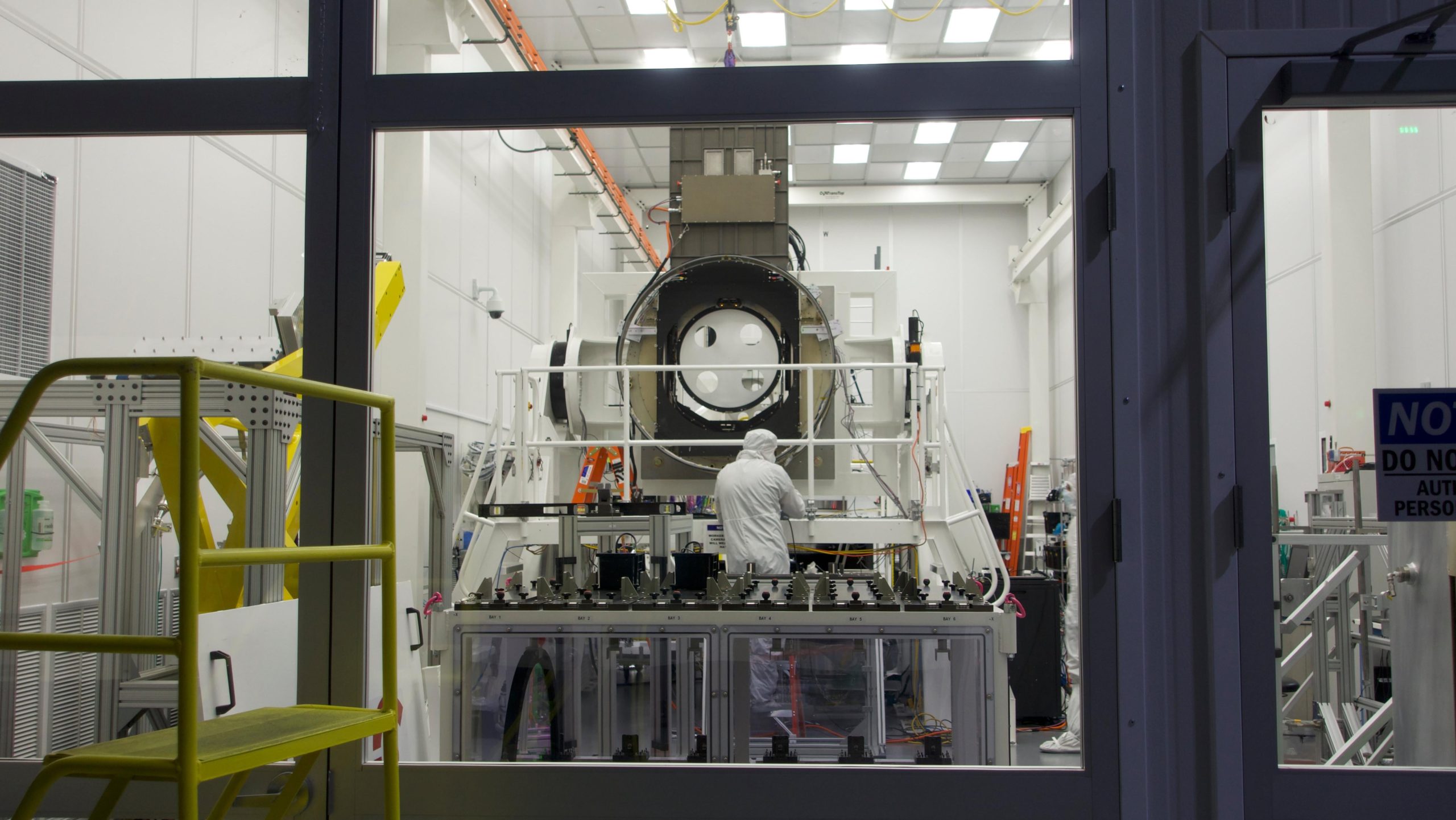 Components of the camera being worked on in a clean room at SLAC National Accelerator Laboratory. (Photo: Isaac Schultz)