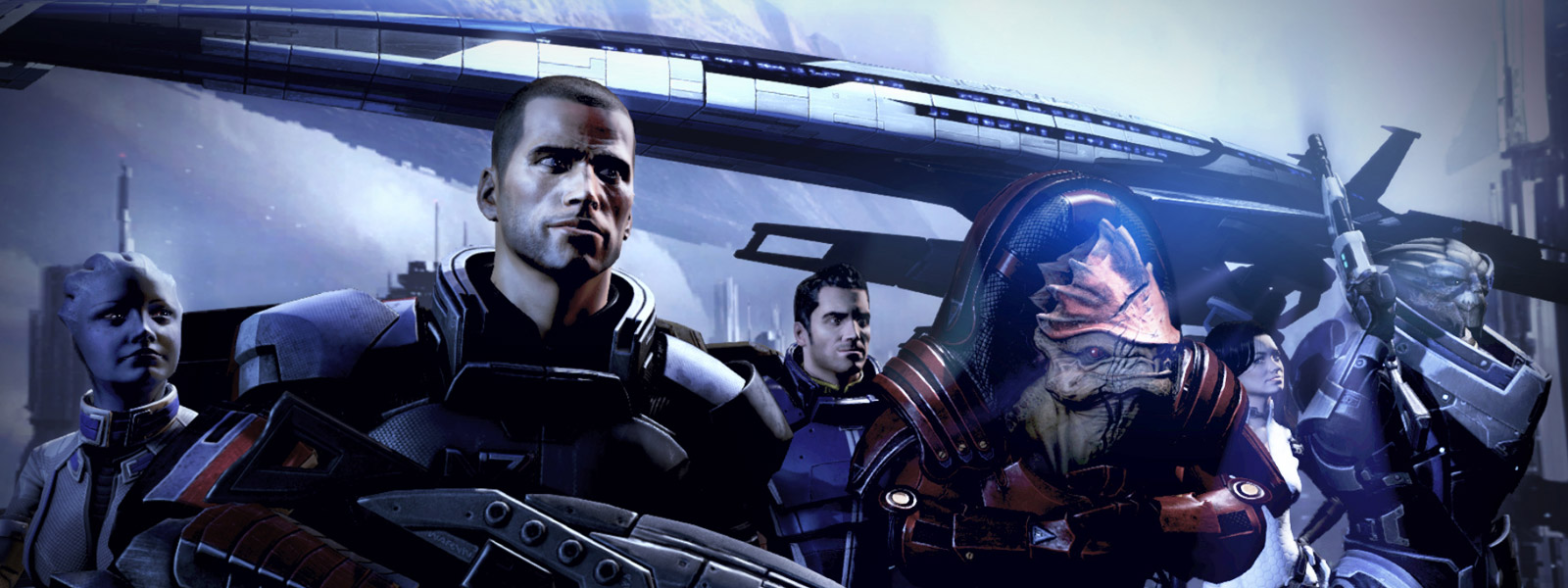 Liara T'Soni, Commander Shepard, Kaiden Alenko, Urdnot Wrex, Miranda Lawson, and Garrus Vakarian stand in front of the Normandy SR3. (Image: BioWare/EA)