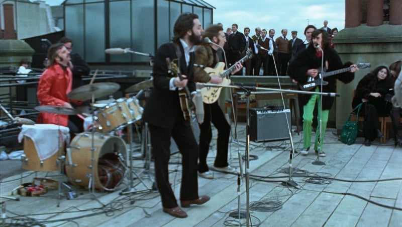 The Beatles could have been on top of Mount Doom (as well as this rooftop) if history had gone a bit differently. (Image: Apple Corps Ltd.)
