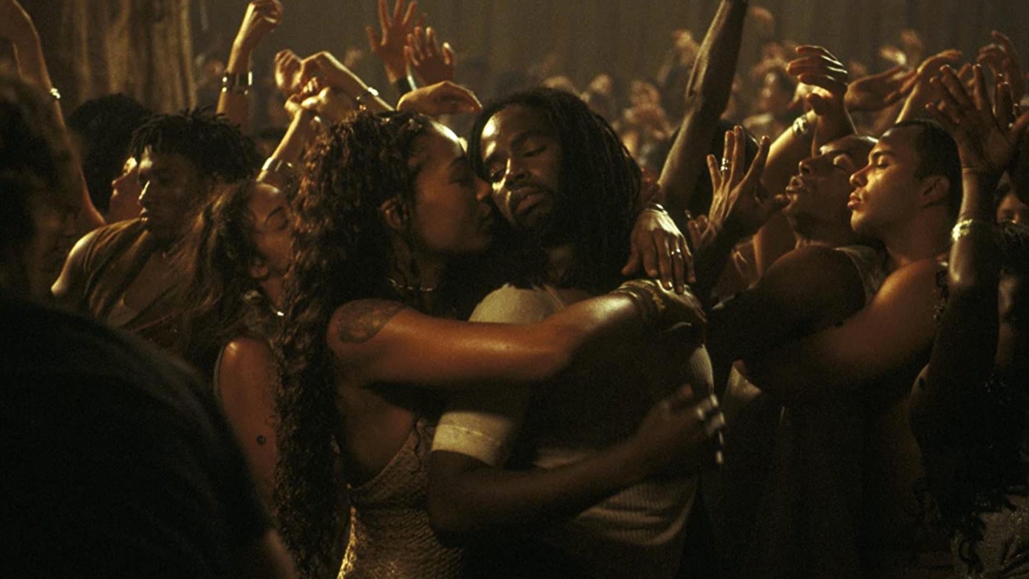 Nona Gaye and Harold Perrineau dancing in Zion. (Image: Warner Bros.)