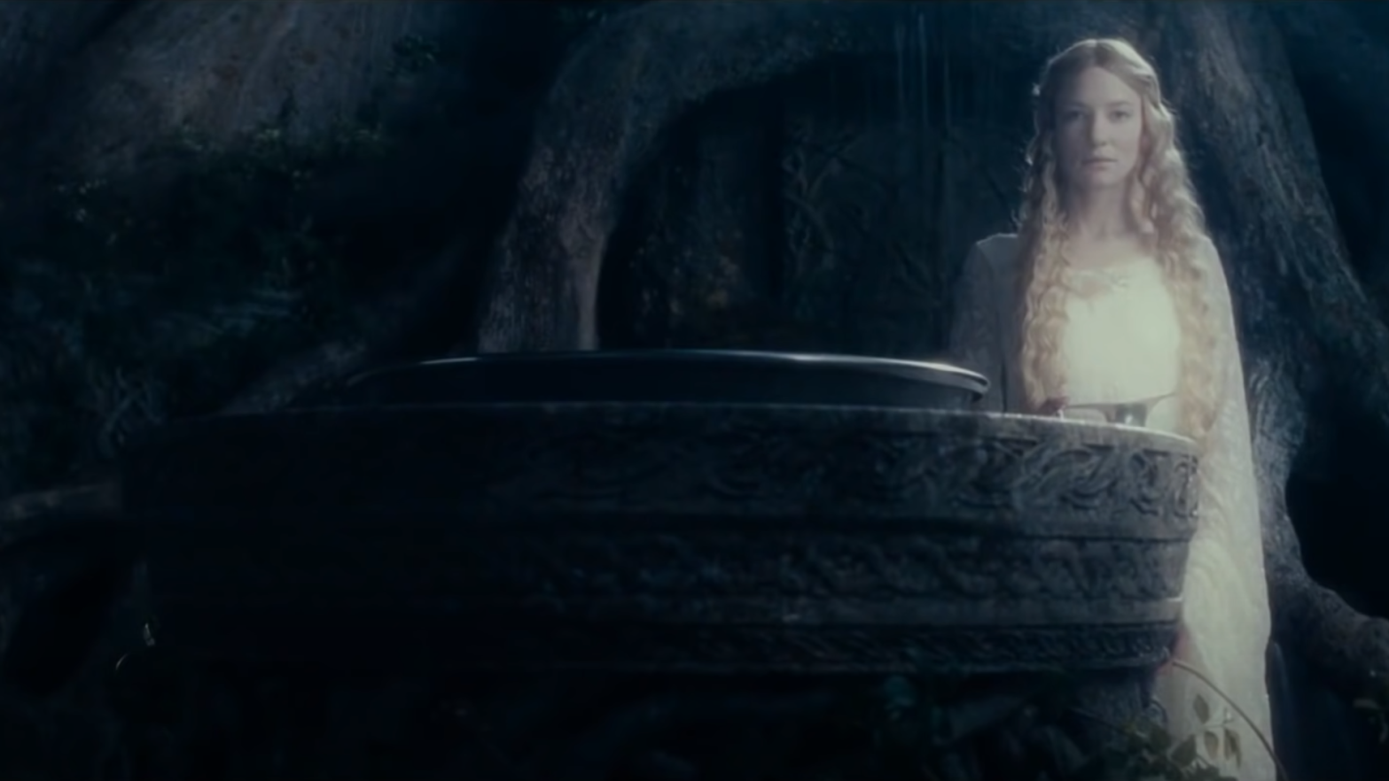 Galadriel offers Frodo a view of things that were, things that are, and some things... that have not yet come to pass. (Screenshot: Warner Bros.)