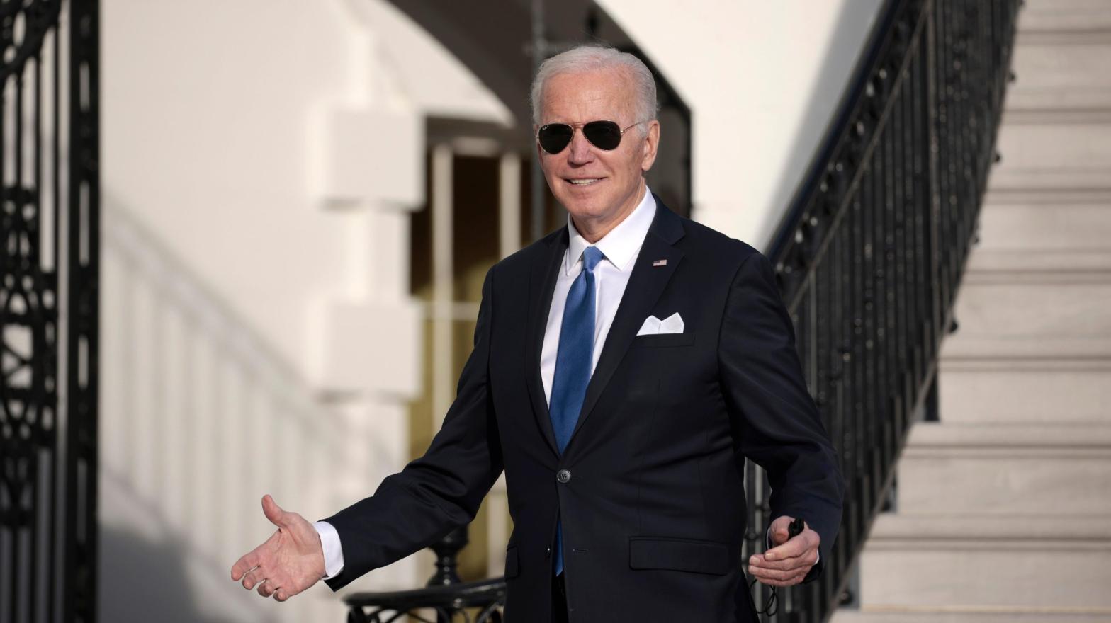 President Joe Biden gestures to journalists after returning to the White House. (Photo: Anna Moneymaker, Getty Images)