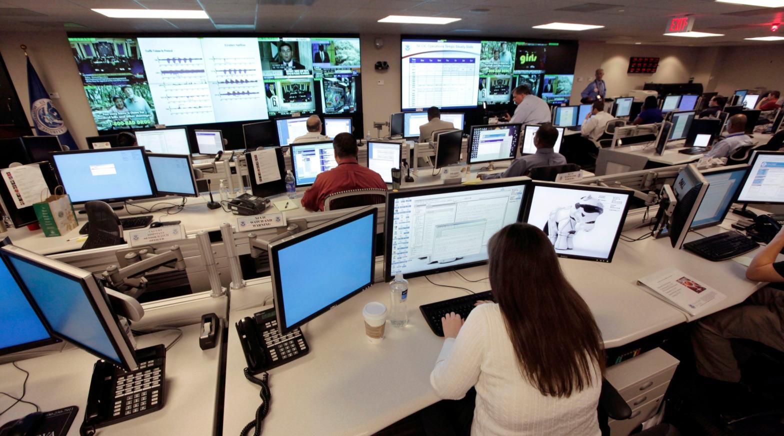 Archival photo showing at team at the National Cybersecurity & Communications Integration Centre (NCCIC) preparing for a hacking defence exercise. (Photo: J. Scott Applewhite, AP)