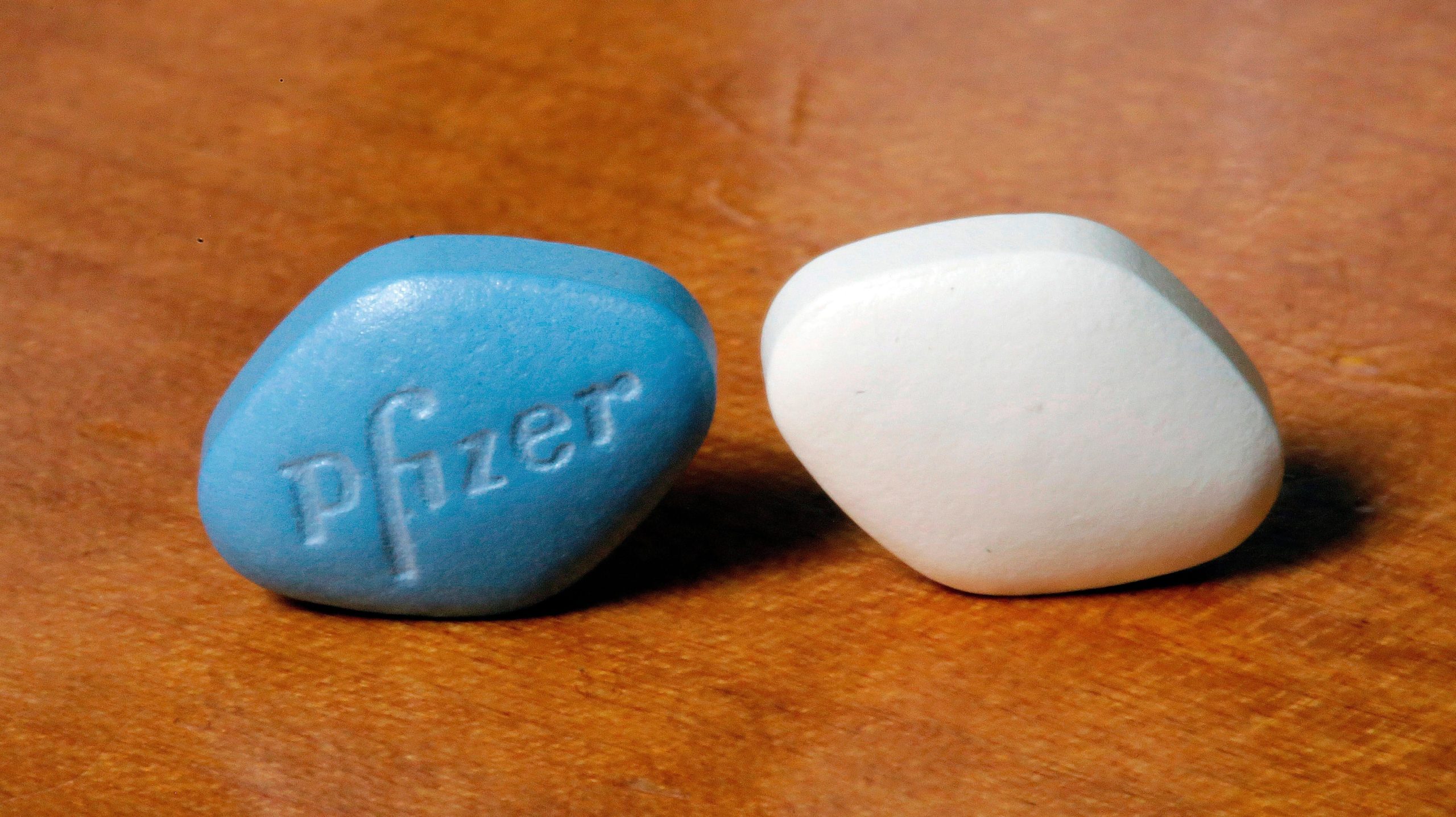 A tablet of Pfizer's Viagra, next to its generic equivalent. Both contain the active ingredient sildenafil (Photo: Richard Drew, Getty Images)