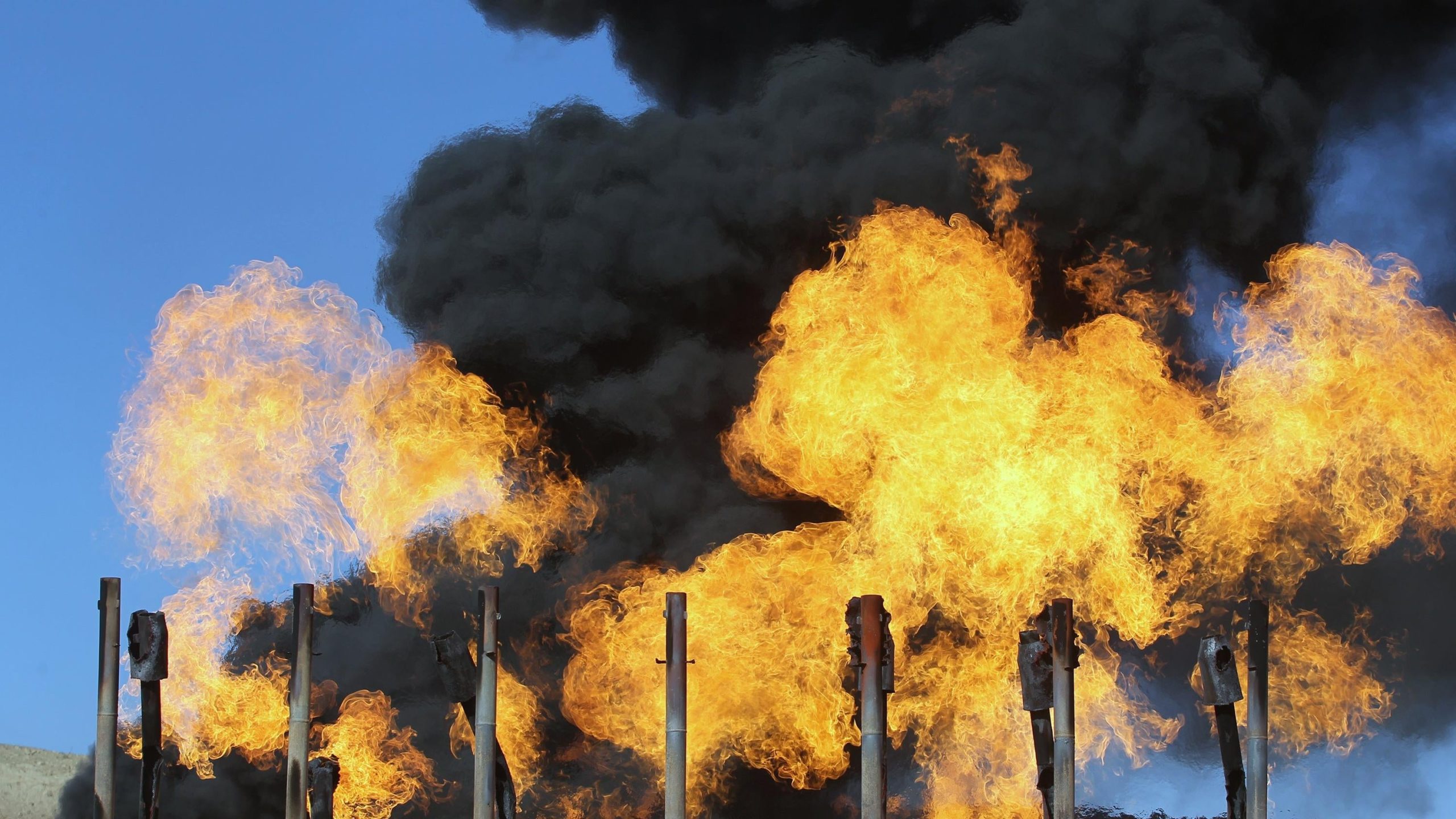 Gas flares at the Havana oil field in Iraq. (Photo: Ahmad Al-Rubaye/AFP, Getty Images)