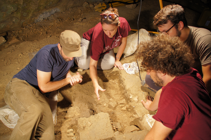 Some of the research team at the grave site. (Photo: Jamie Hodgkins, PhD, CU Denver)