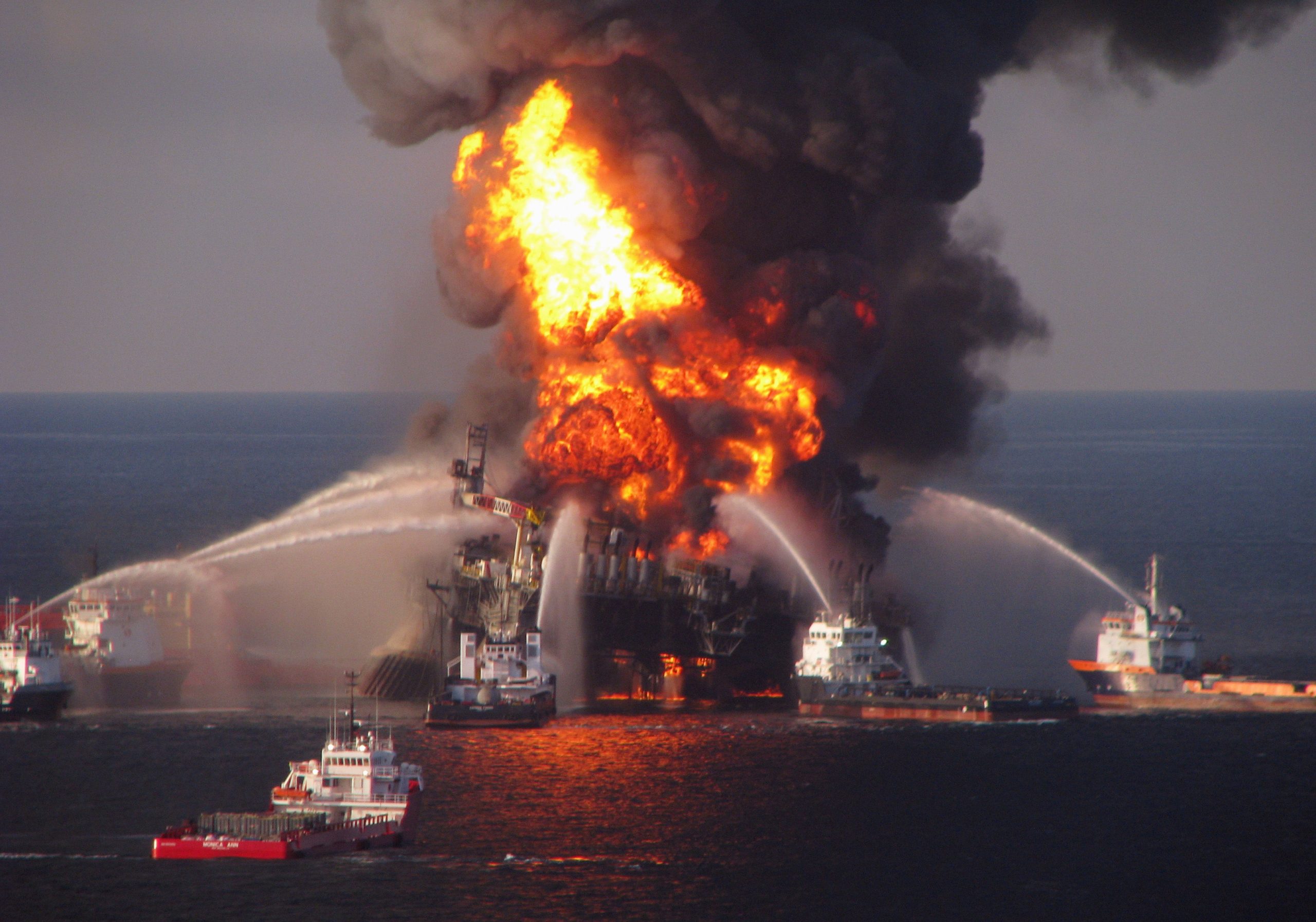 Fire boat response crews spray water on the burning BP Deepwater Horizon offshore oil rig on April 21, 2010. (Photo: U.S. Coast Guard, AP)