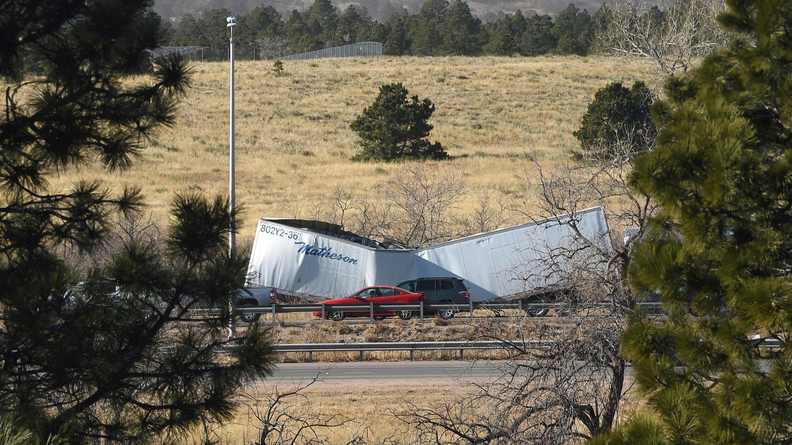 High winds toppled a semi-truck on I-25. (Photo: Jerilee Bennett/The Gazette, AP)