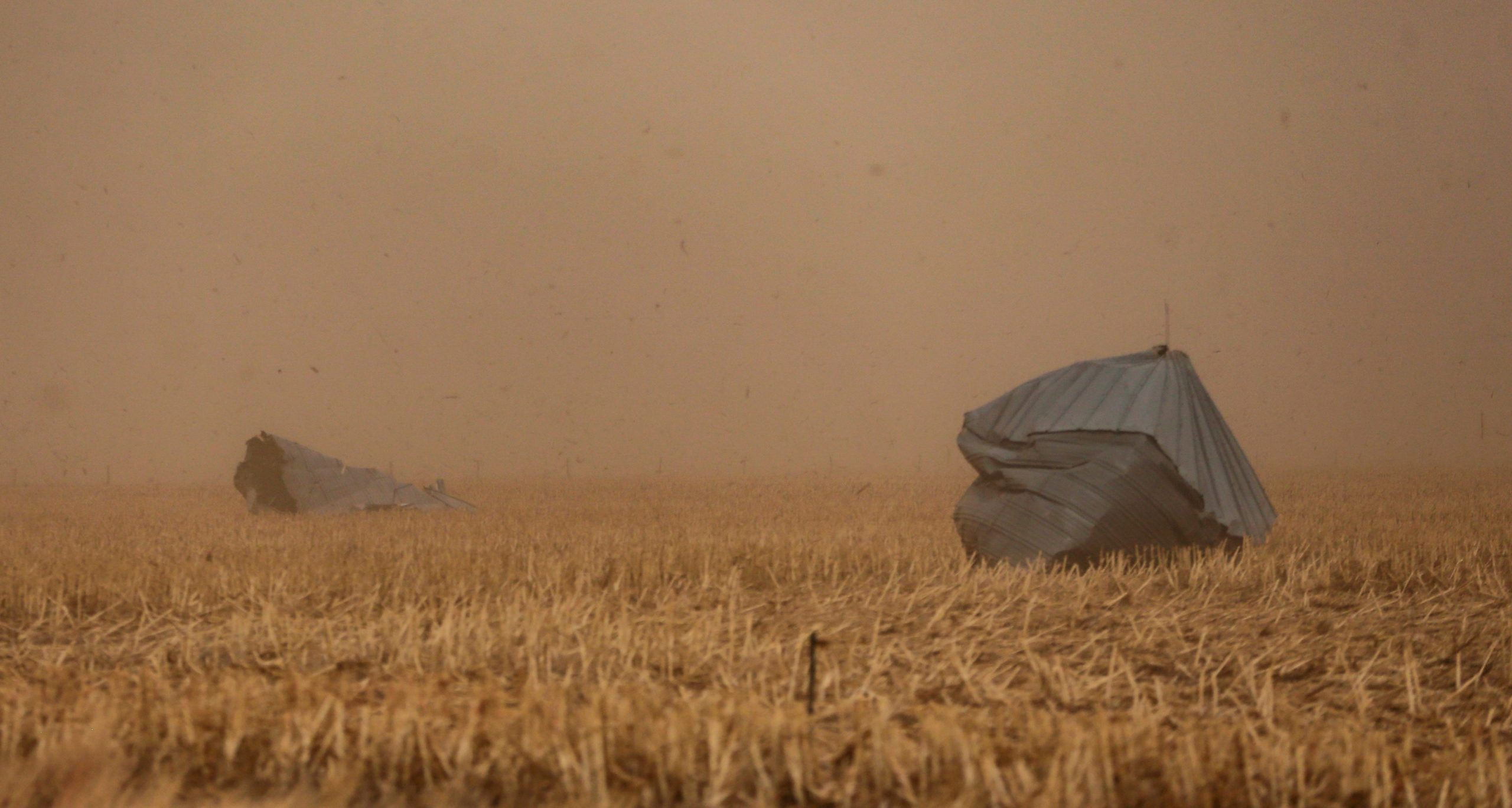 The Hodgeman County Undersheriff confirmed these grain bins were blown away from a nearby farm into cornfield across Hwy 283 in Jetmore, Kansas. (Photo: Travis Heying/The Wichita Eagle, AP)