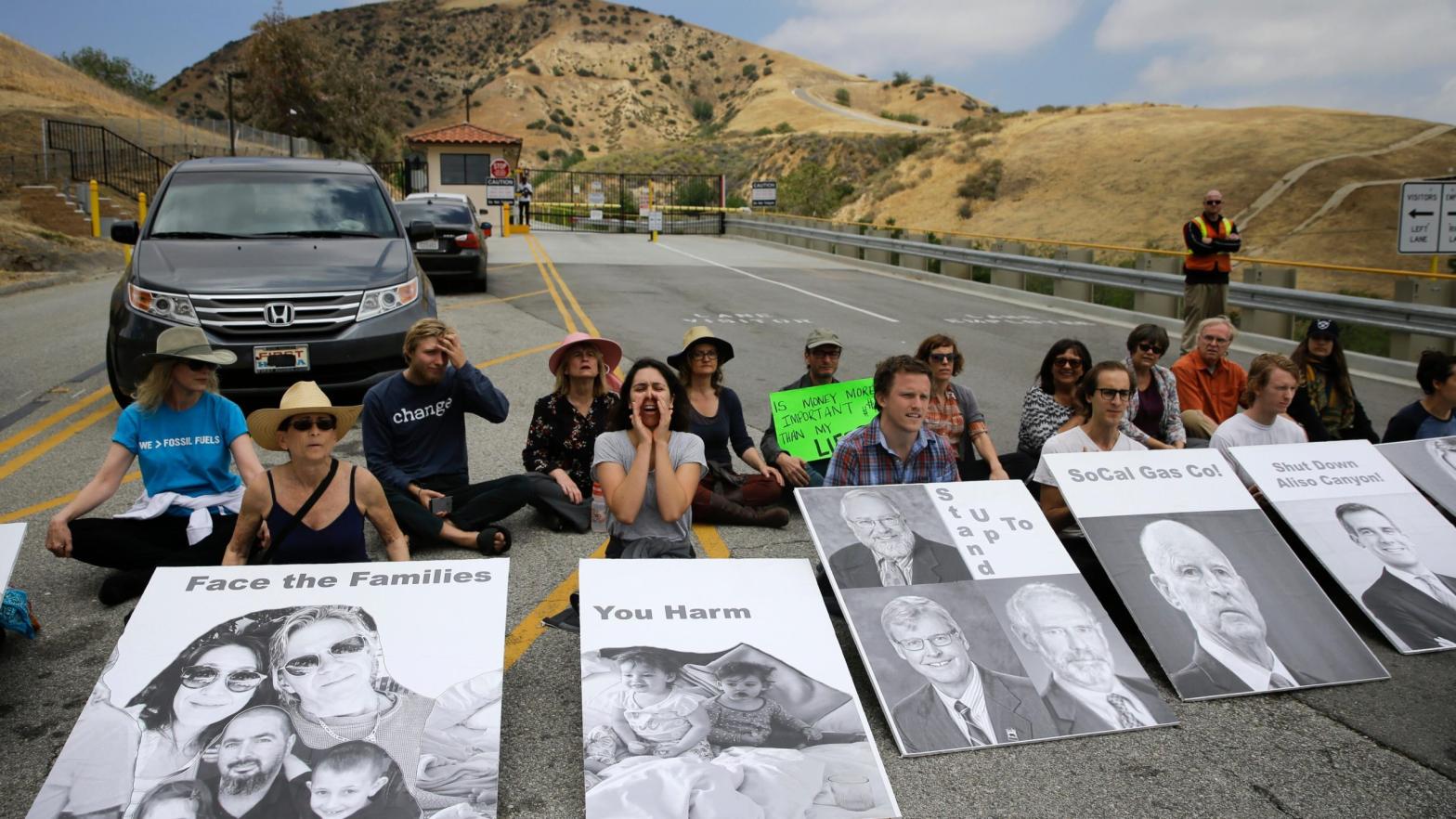People chant slogans during a protest outside the Aliso Canyon storage facility, in the Porter Ranch section of Los Angeles, May 2016.  (Photo: Jae C. Hong, AP)
