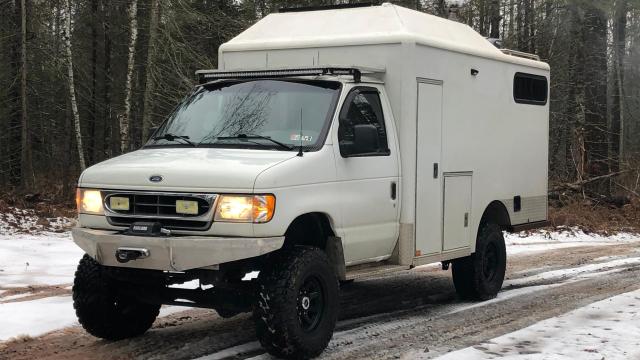 This Ford E-350 Ambulance Traded Its Lights and Sirens for a Lift Kit and Camper Conversion
