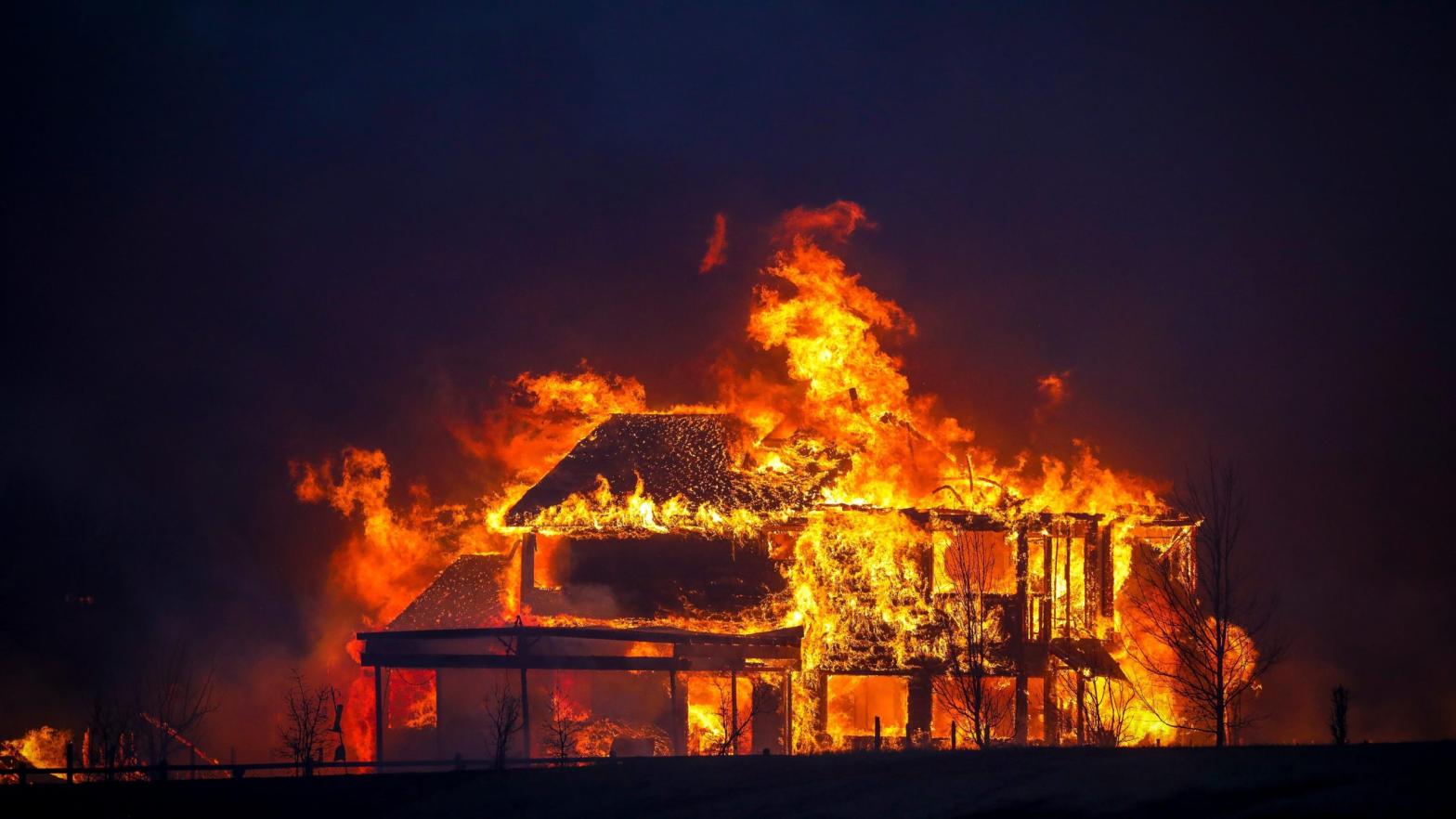 A home burns after a fast-moving wildfire swept through the area in the Centennial Heights neighbourhood of Louisville, Colorado. (Photo: Marc Piscotty, Getty Images)