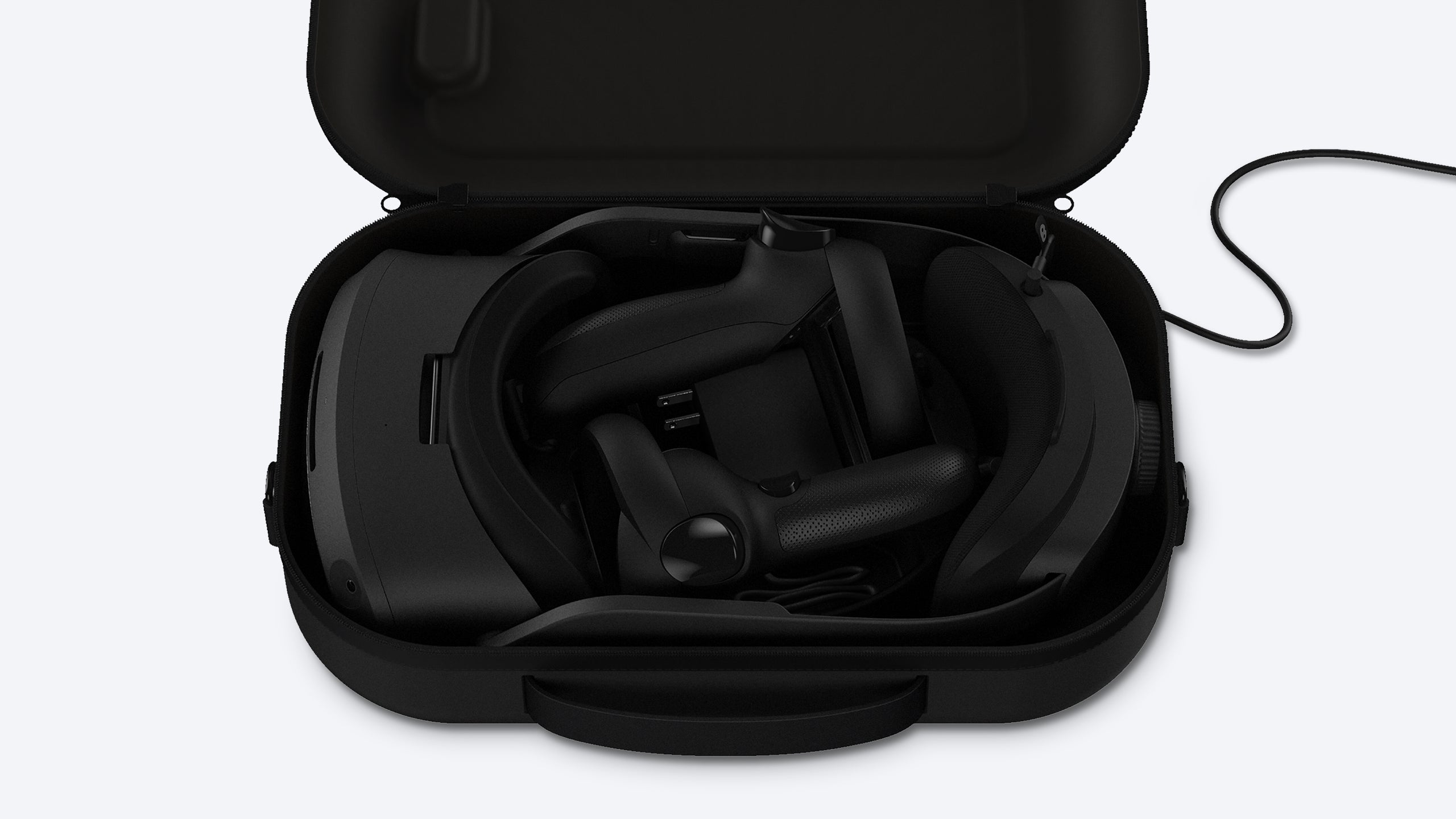 The Vive Focus 3 Carrying Case charges and automatically pairs a headset and controllers. (Photo: HTC)