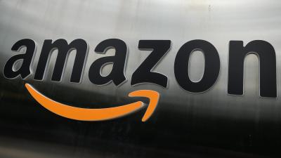 Amazon Cuts Paid Leave for Workers With COVID-19 After CDC Updates Guidance