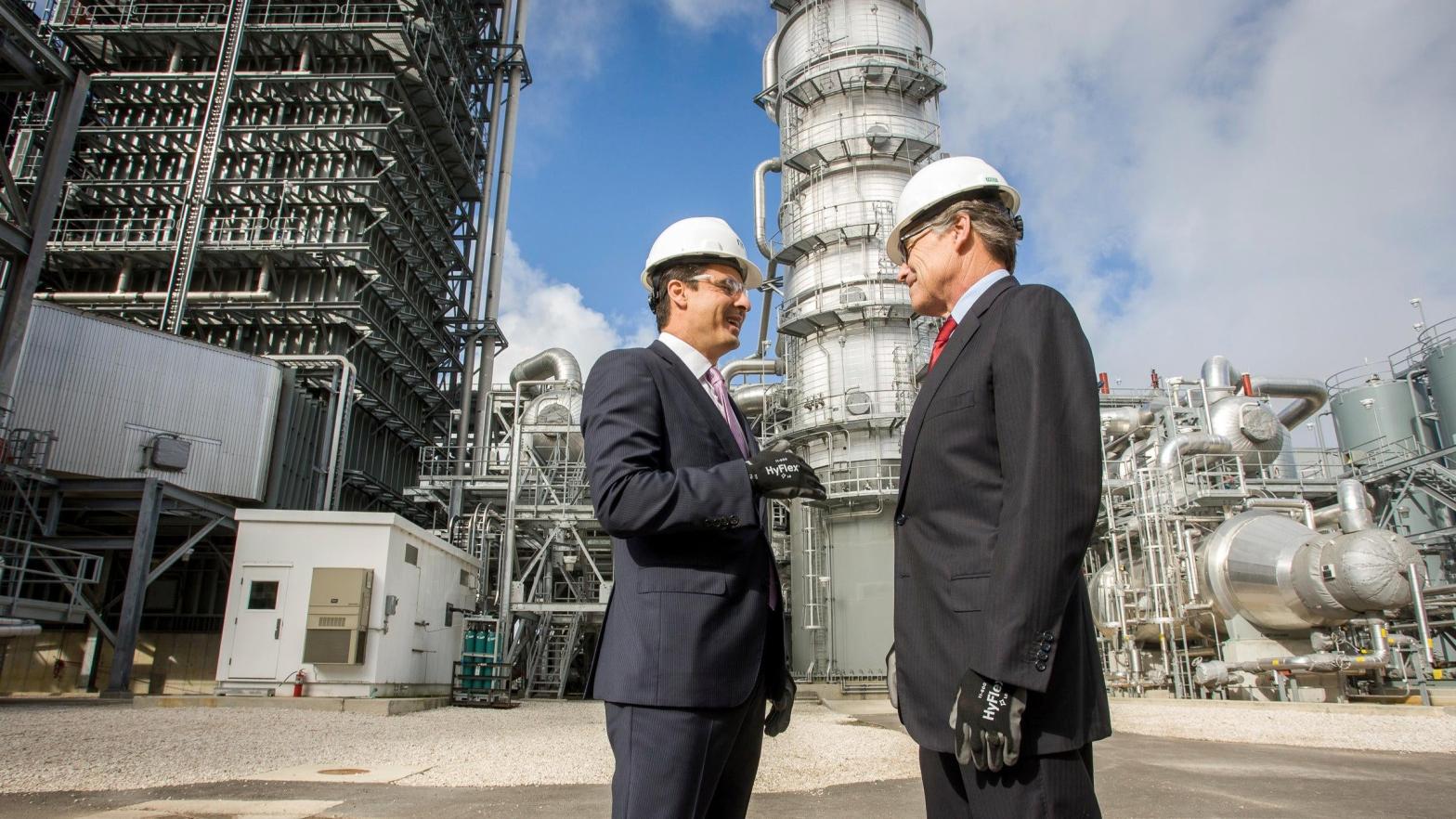 Then-Secretary of Energy Rick Perry (right) joins NRG Energy CEO Mauricio Gutierrez (left) on a tour of the Petra Nova carbon capture and enhanced oil recovery system on Thursday, April 13, 2017. The plant closed less than four years after this photo was taken. (Photo: Paul Ladd, AP)