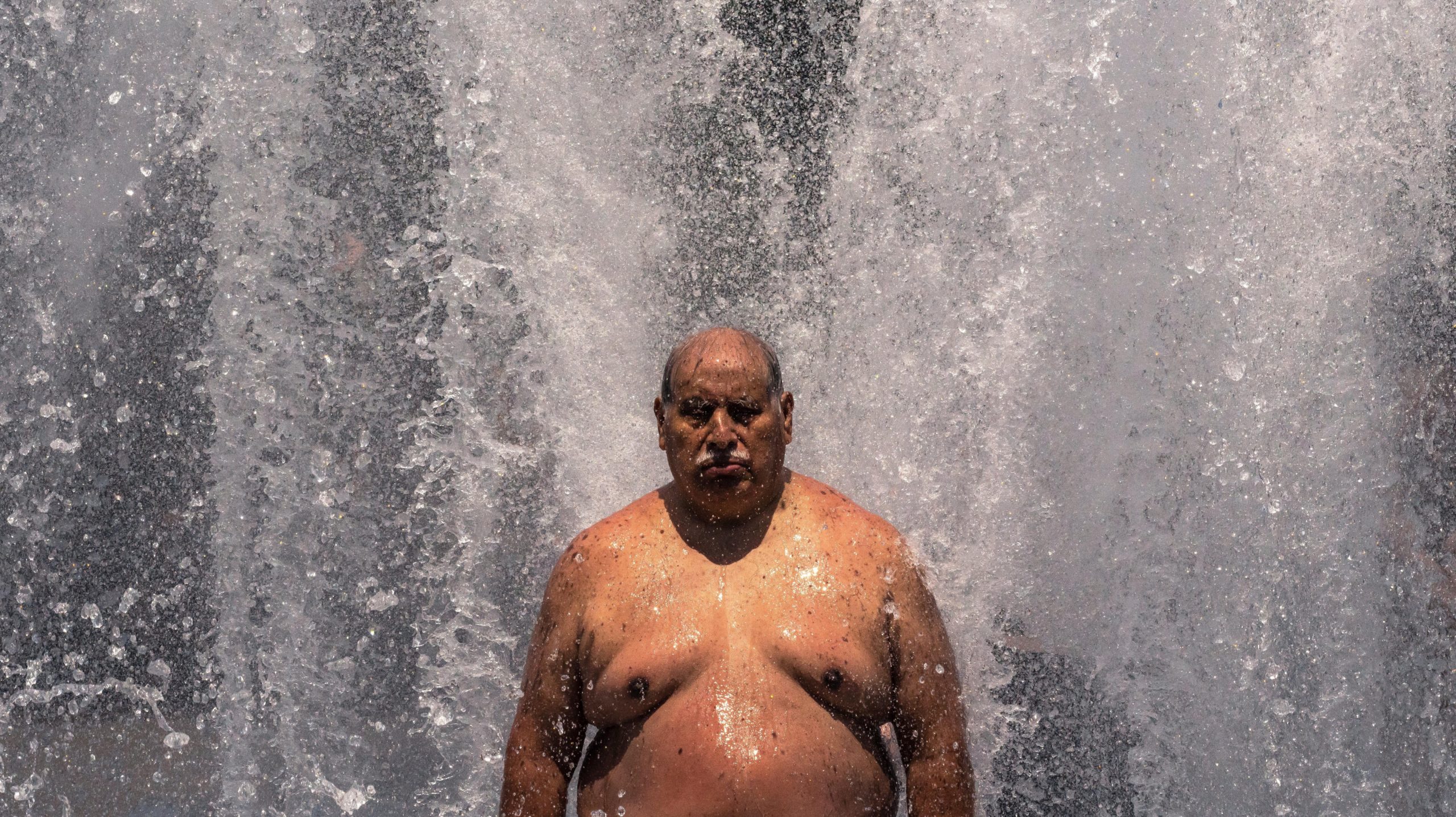 Pablo Miranda cools off in the Salmon Springs Fountain on June 27, 2021, in Portland, Oregon. Record-breaking temperatures lingered over the Northwest during a historic heatwave this weekend.  (Photo: Credit Nathan Howard, Getty Images)