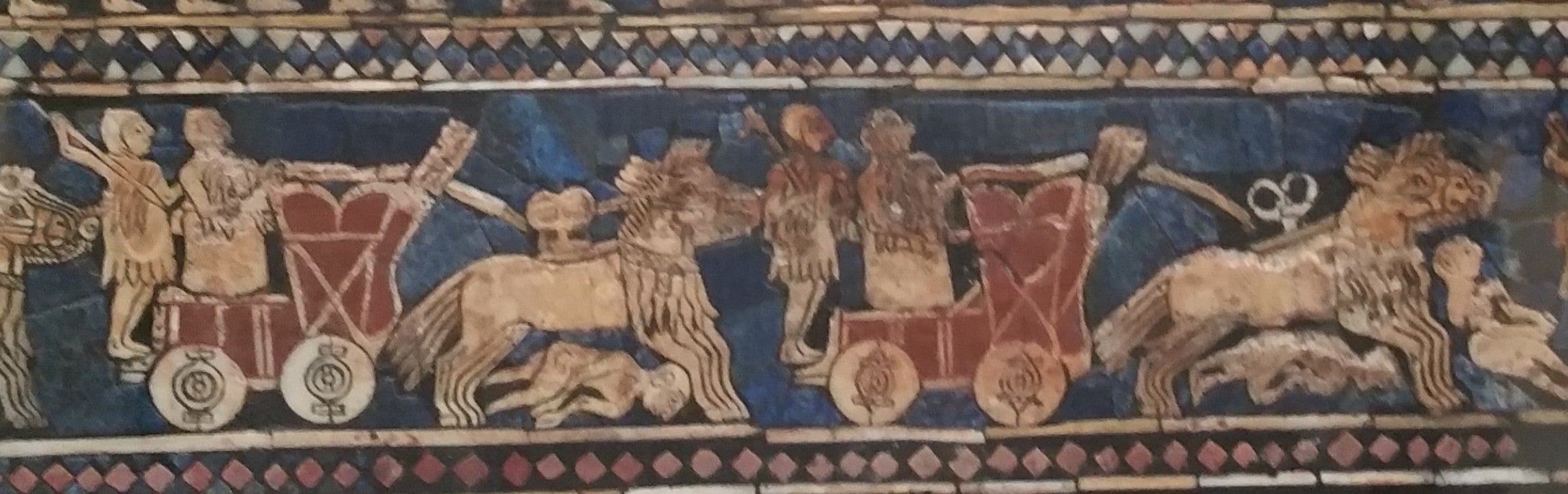 A panel of the 4,500-year-old Standard of Ur, which depicts kungas hauling chariots.  (Photo: Thierry Grange / IJM / CNRS-Université de Paris)