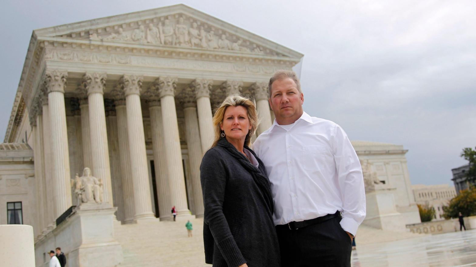 The landowners at the centre of this case, Mike and Chantell Sackett, pose in front of the Supreme Court in 2011. (Photo: Haraz N. Ghanbari, AP)