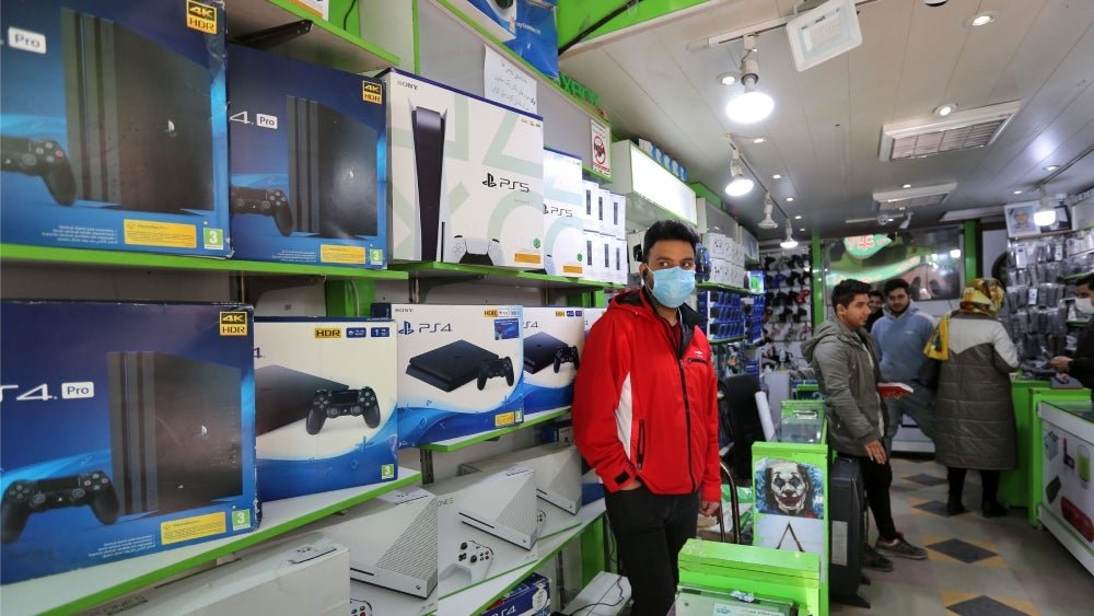Not every game shop is like this one in Tehran with PS5s on the shelves.  (Photo: ATTA KENARE/AFP, Getty Images)