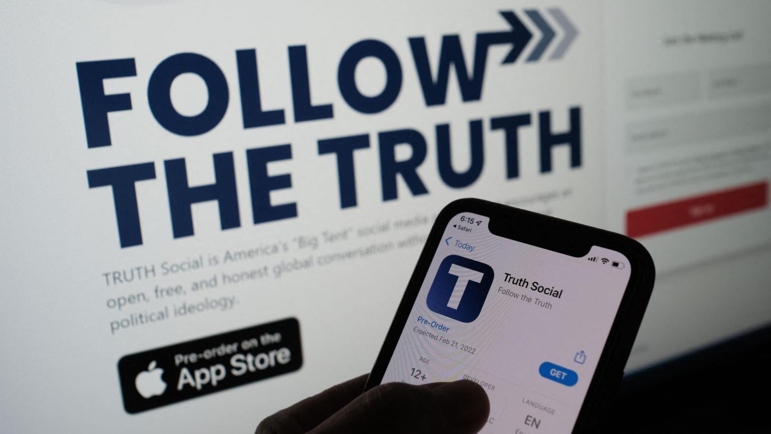 The Truth Social logo displayed on a smartphone and computer screen; used here as stock photo. (Photo: Chris Delmas / AFP via Getty Images, Getty Images)