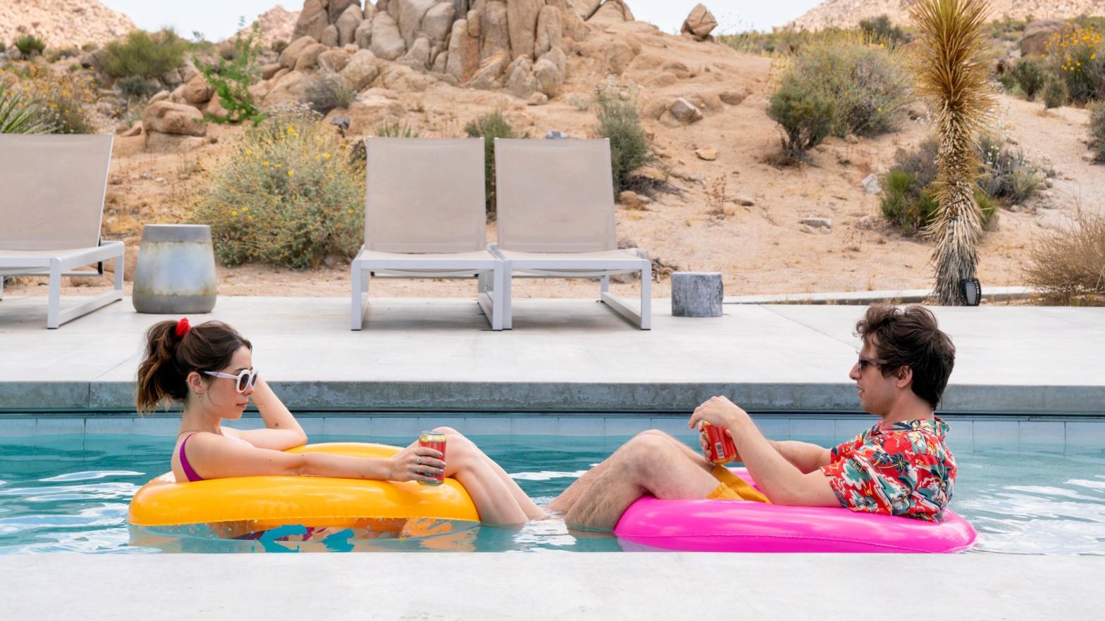 Cristin Milioti and Andy Samberg find each other in a time loop in Palm Springs. (Image: Hulu)