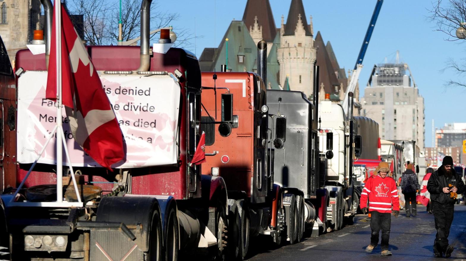 Wellington Street is lined with trucks once again after city officials negotiated to move some trucks away from downtown residences, on the 18th day of a protest against COVID-19 measures that has grown into a broader anti-government protest, in Ottawa, on Monday, Feb. 14, 2022. (Photo: Justin Tang/The Canadian Press via AP, AP)