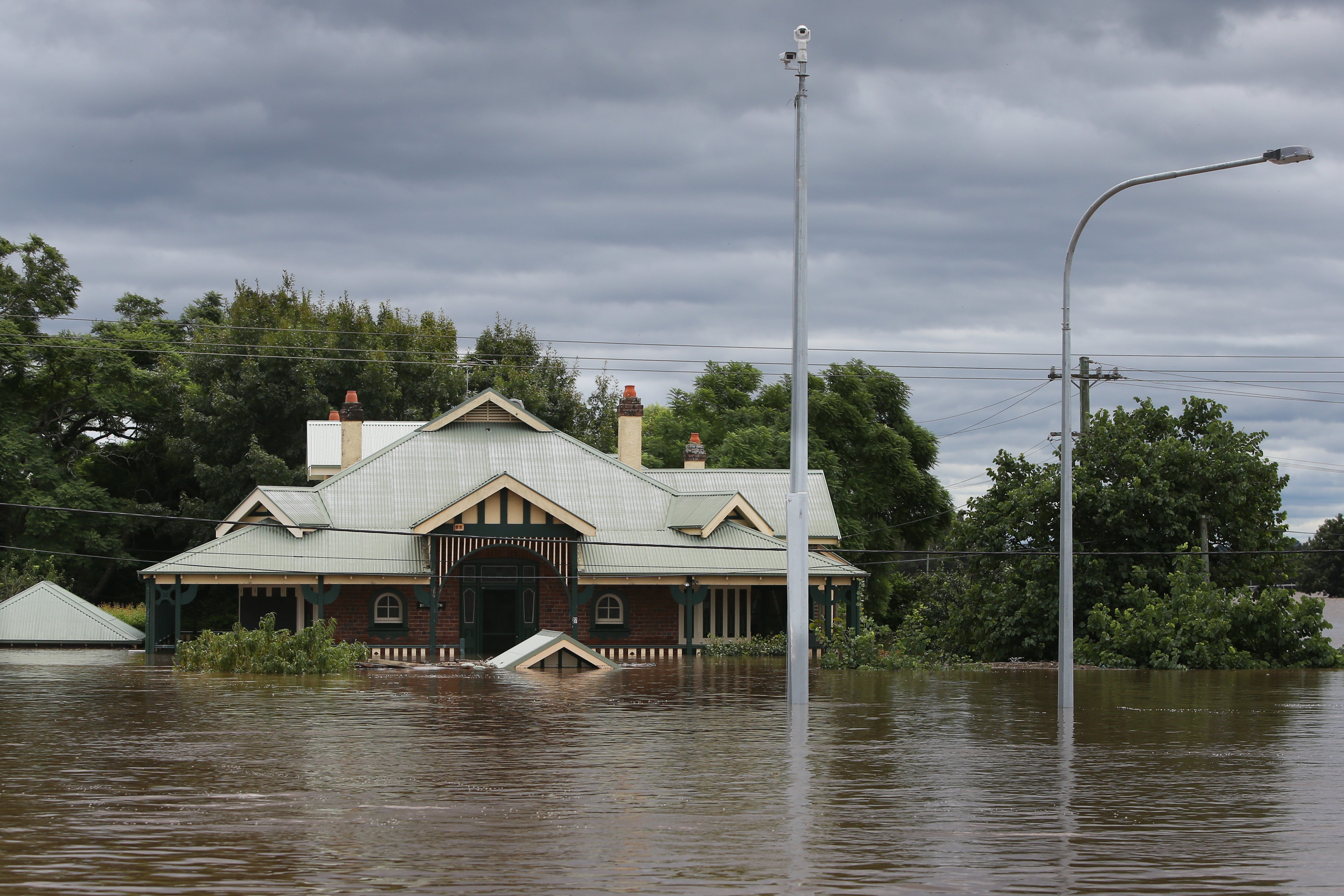 A home is seen inundated by floodwaters along the Hawkesbury River in Windsor on March 9, 2022 in Sydney, Australia. (Photo: Lisa Maree Williams, Getty Images)