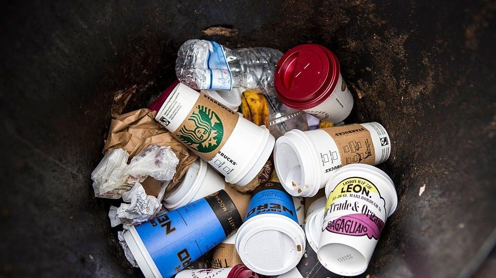 Coffee cups make up the majority of the contents of a street rubbish bin in central London.  (Photo: Pictures Ltd./Corbis, Getty Images)