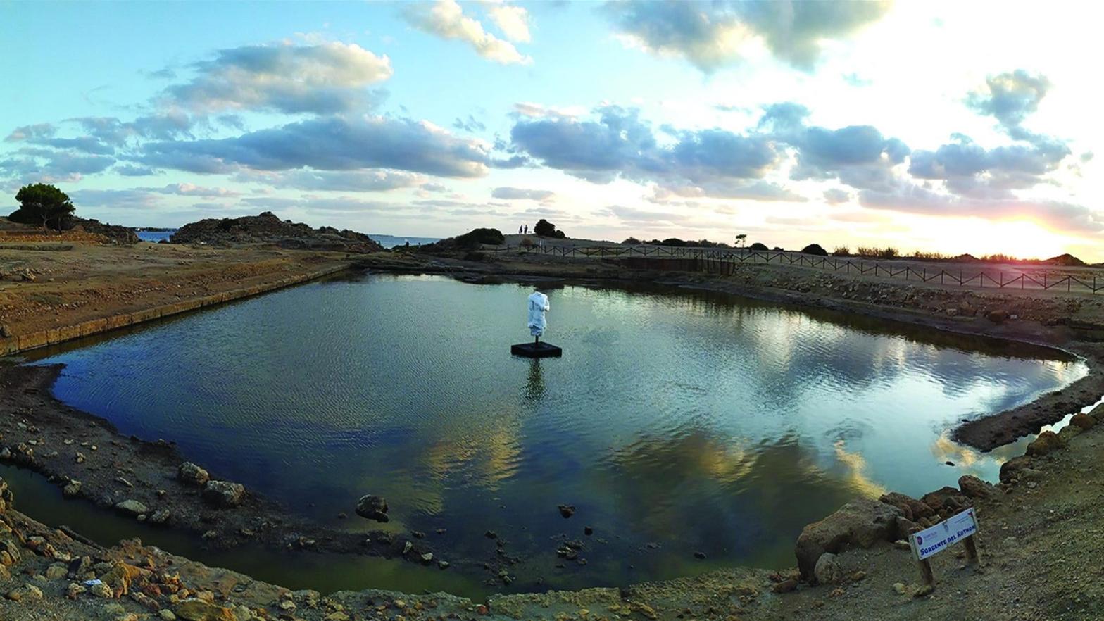 Upon completion of the excavations, the basin was refilled with water and replica statue placed on the pedestal at centre.  (Photo: Sapienza University of Rome Expedition to Motya)