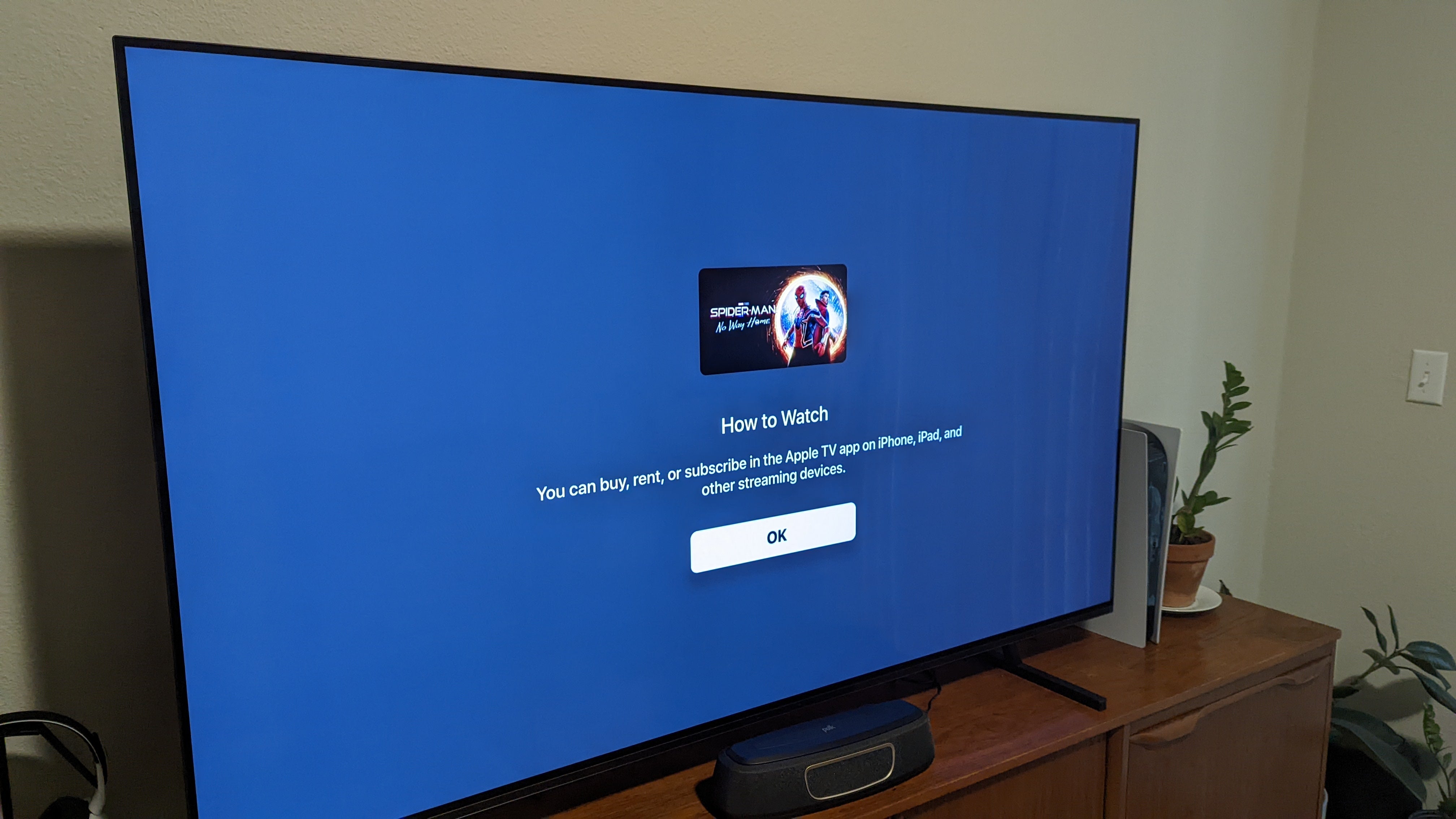 The prompt Apple TV shows when you attempt to rent/purchase a movie on a Google TV. (Photo: Phillip Tracy/Gizmodo)